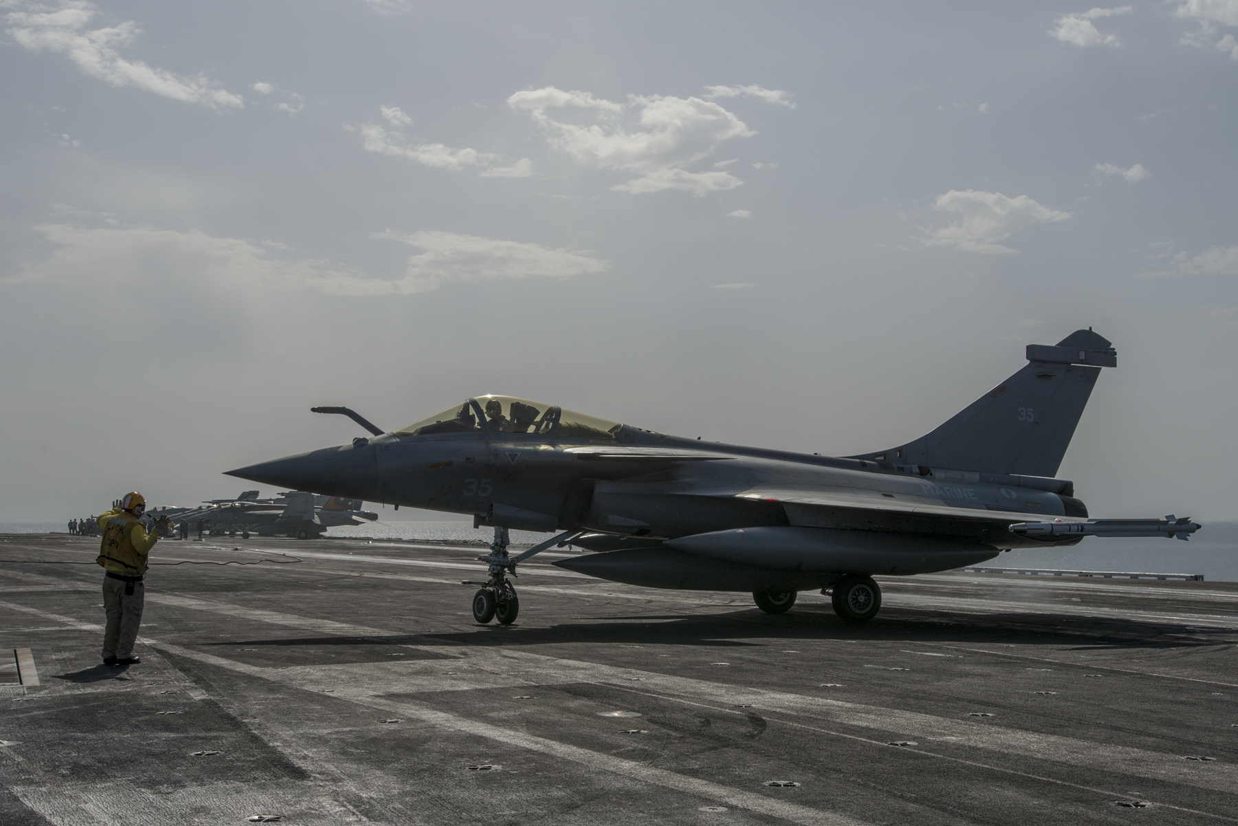 A French navy Rafale Marine aircraft from French navy nuclear-powered aircraft carrier Charles de Gaulle (R91) during carrier qualifications aboard carrier USS Carl Vinson (CVN-70). US Navy Photo