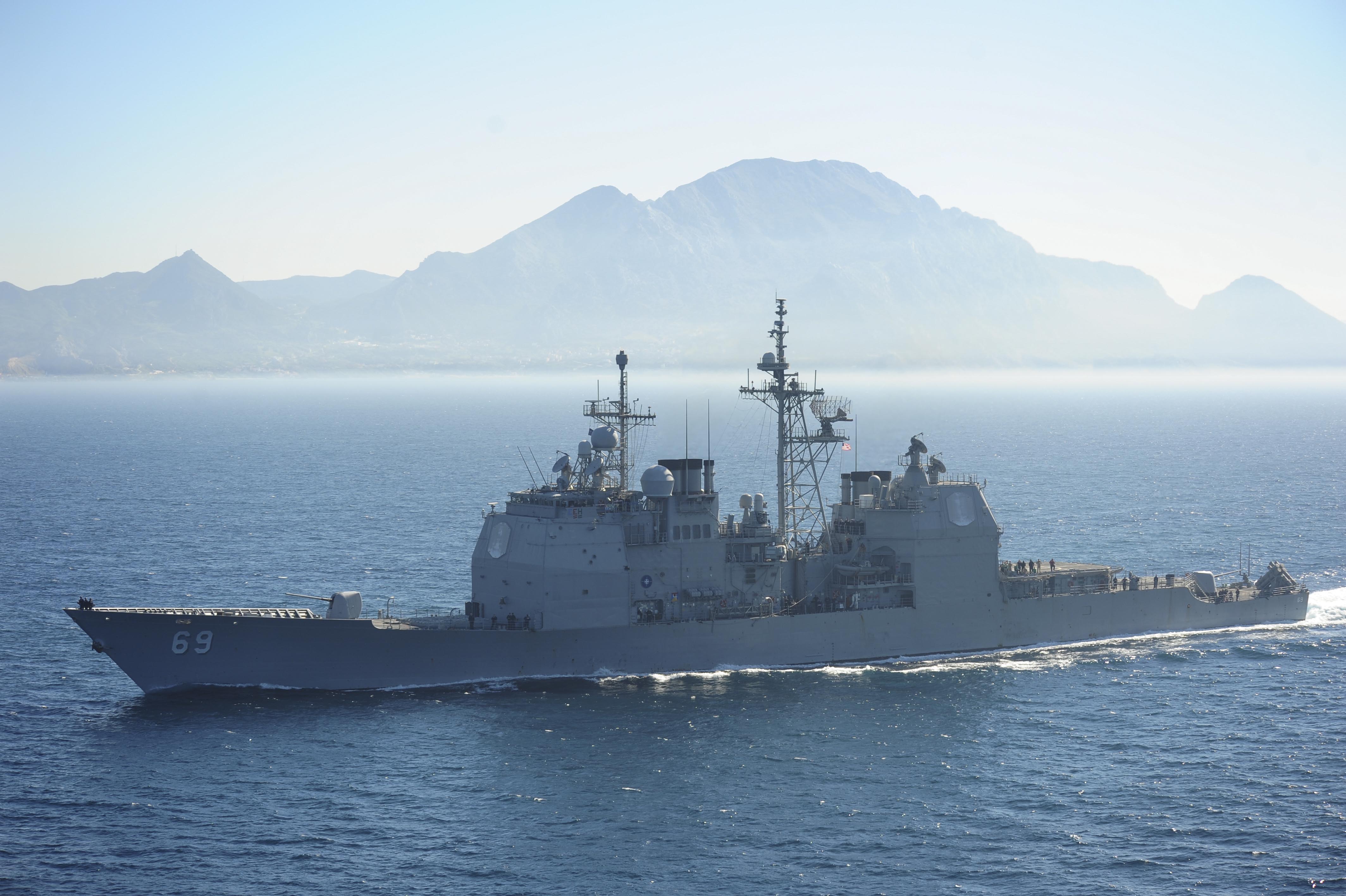 The Ticonderoga-class guided-missile cruiser USS Vicksburg (CG 69) transits the Strait of Gibraltar on March 31, 2015, as part of the Theodore Roosevelt Carrier Strike Group. US Navy photo.