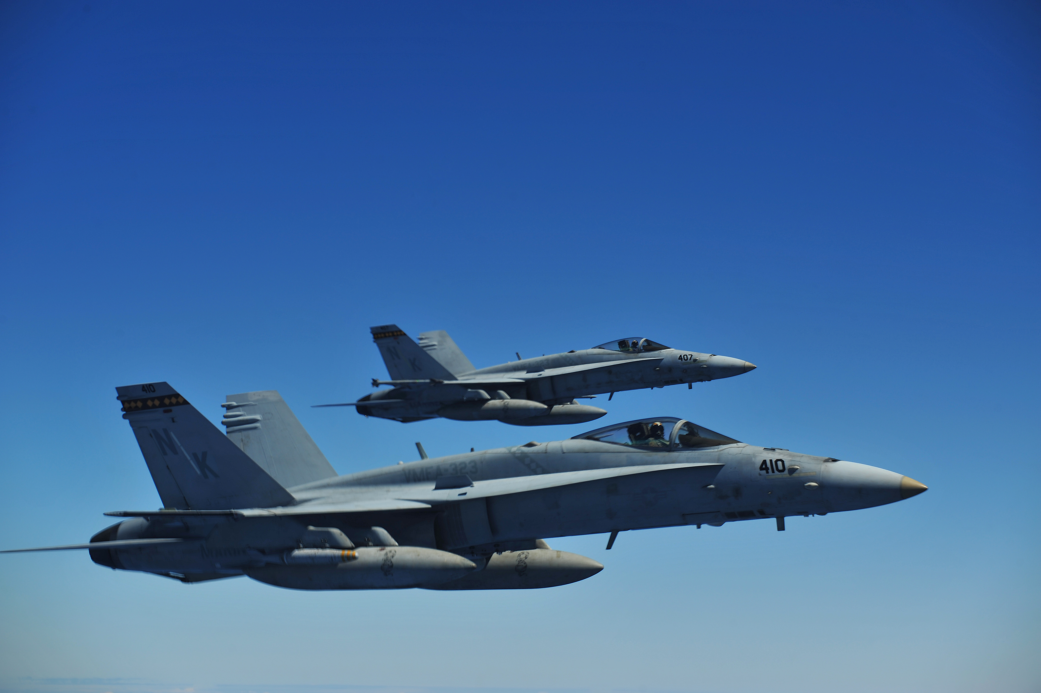 Two Marine Corps F/A-18C Hornets assigned to Marine Fighter Attack Squadron (VMFA) 323 fly a mission during Rim of the Pacific (RIMPAC) 2010. Two planes from the same squadron made an emergency landing in Taiwan on Wednesday. US Navy Photo