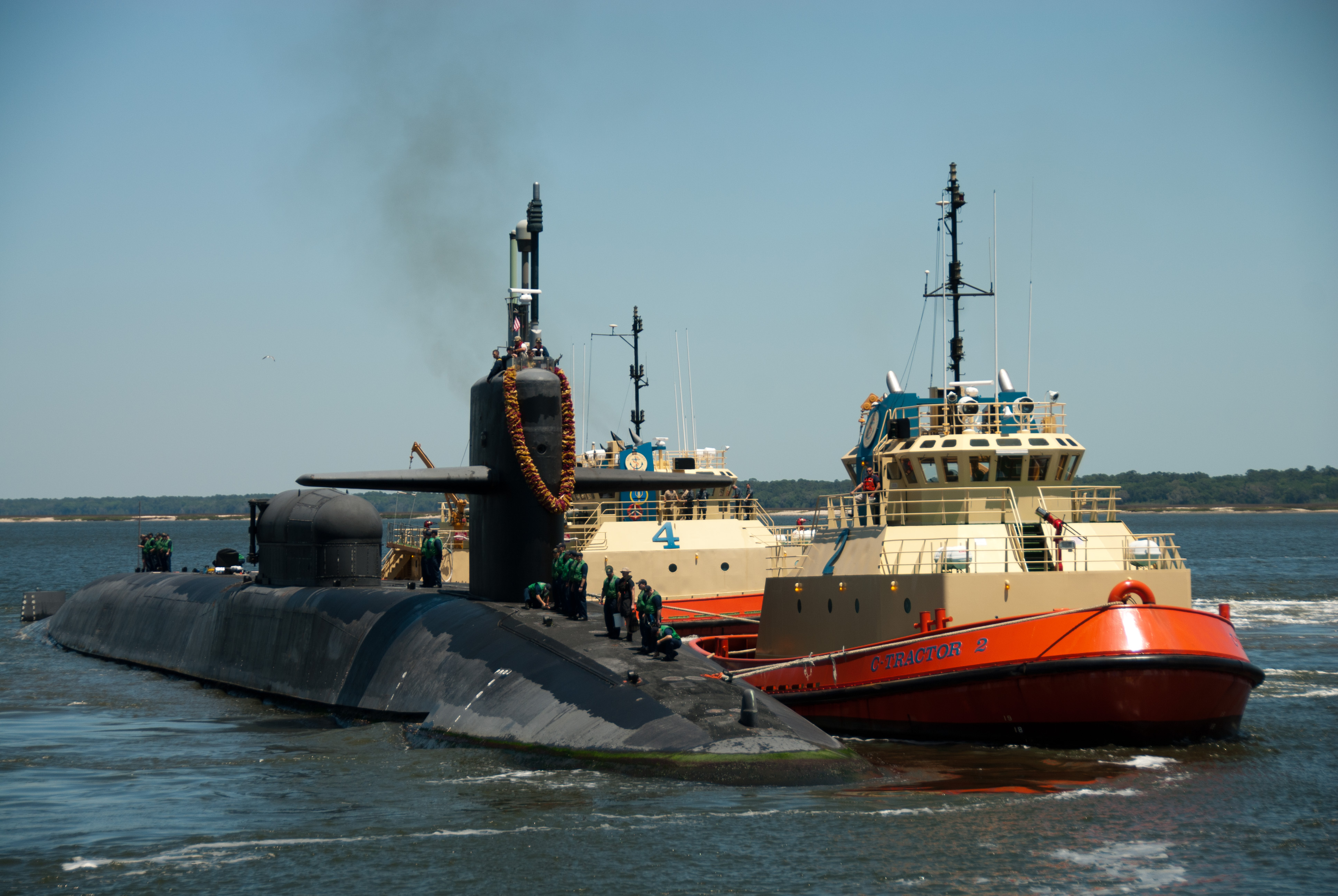 The Ohio-class guided-missile submarine USS Florida (SSGN 728) arrives at Naval Submarine Base Kings Bay in April 2011. Florida returned after a 15-month deployment that included participated in Operation Odyssey Dawn, making the boat the first guided-missile submarine to launch Tomahawk land attack missiles. US Navy photo.