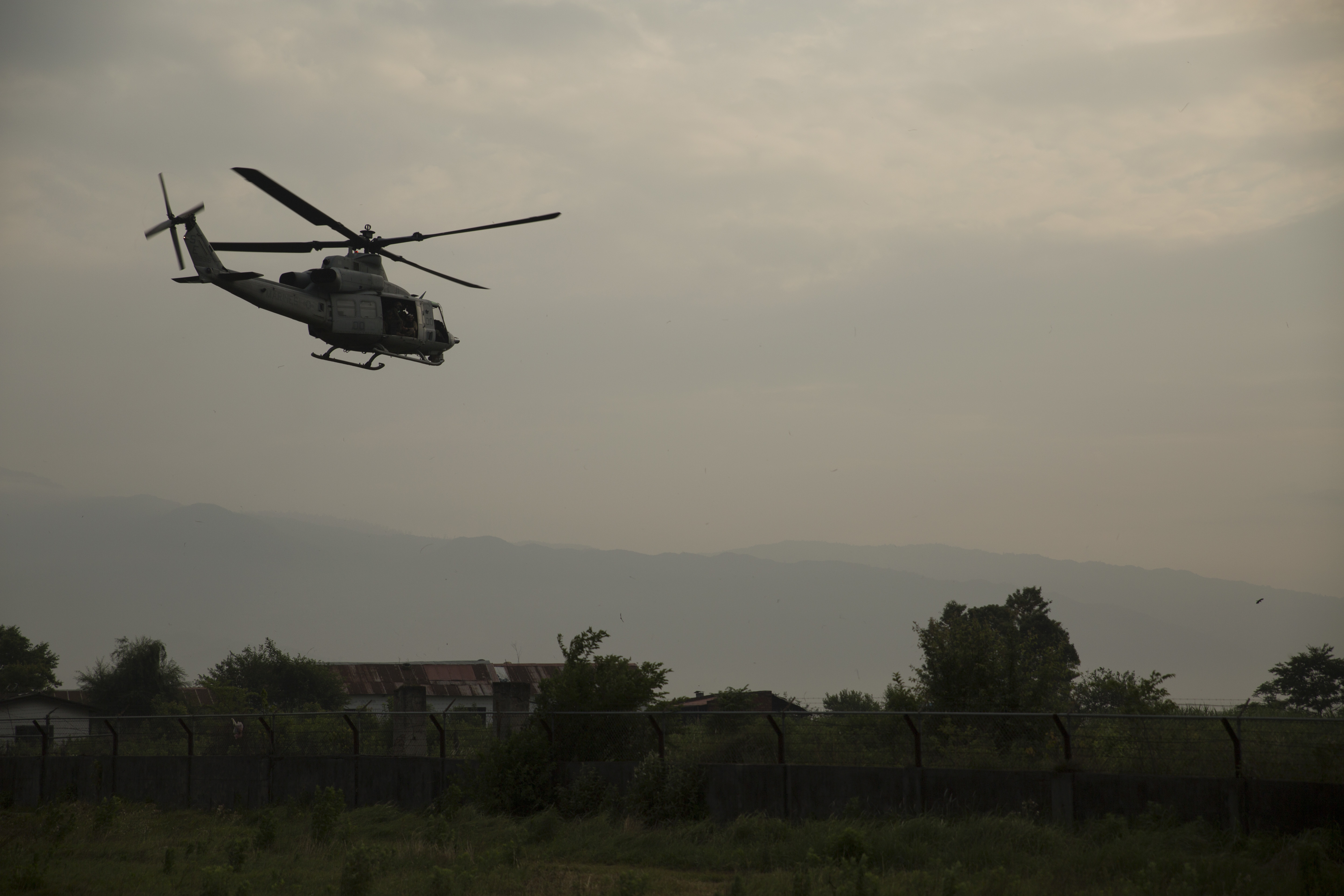 A UH-1Y Huey helicopter takes off for a search and rescue mission from the Tribhuvan International Airport in Kathmandu, Nepal, May 13, to find the missing UH-1Y Huey assigned to Marine Light Attack Helicopter Squadron 469, carrying six Marines and two Nepalese soldiers. US Marine Corps photo.