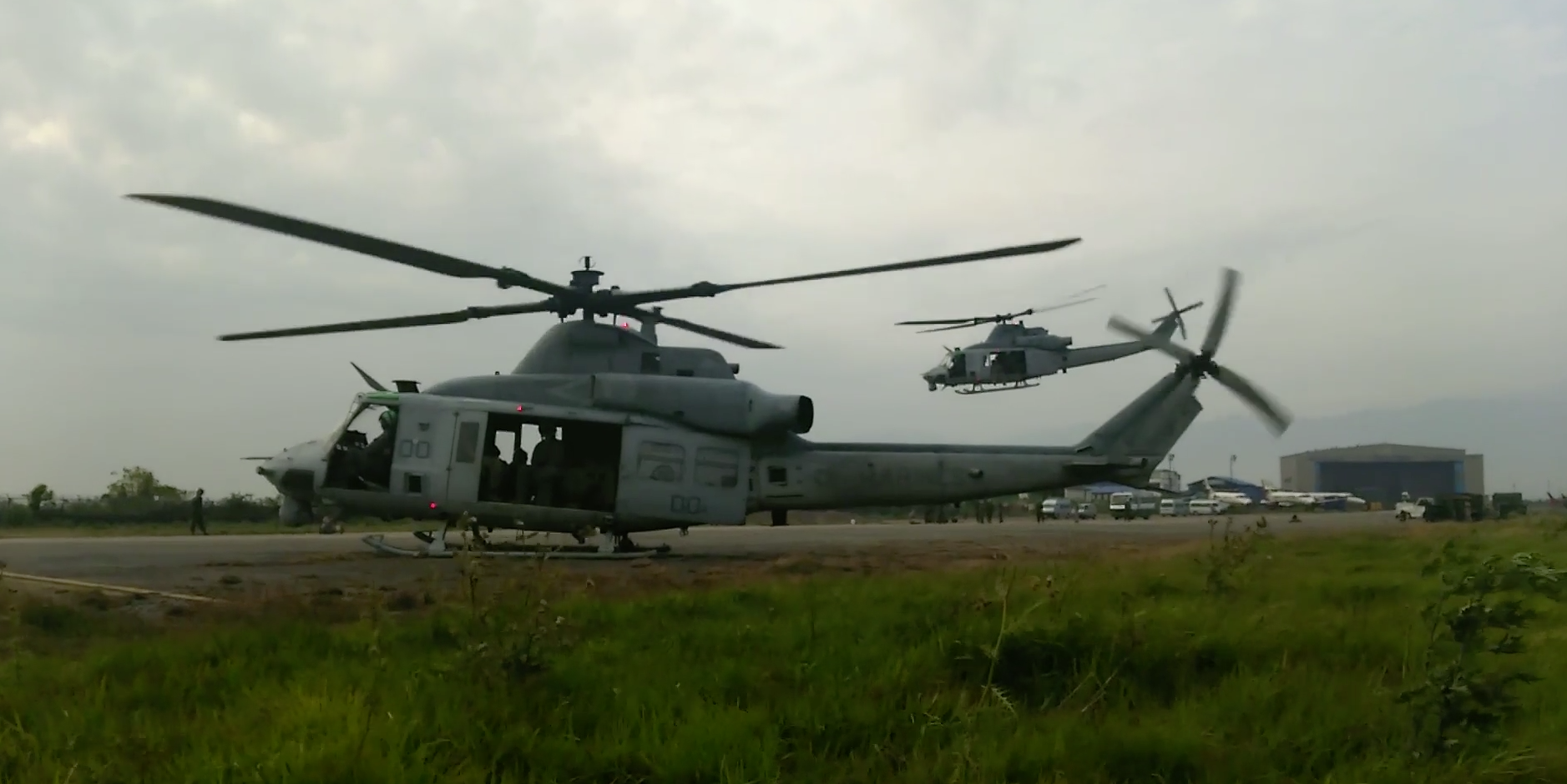 Two UH-1Y helicopters with Marine Light Attack Helicopter Squadron (HMLA) 469, take off from the Tribhuvan International Airport in Kathmandu, Nepal, May 13, 2015. US Marine Corp Image