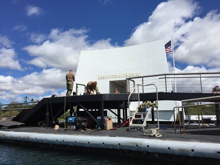 US Navy Seabees conduct repairs on the USS Arizona Memorial on May 29, 2015. US National Park Service Photo
