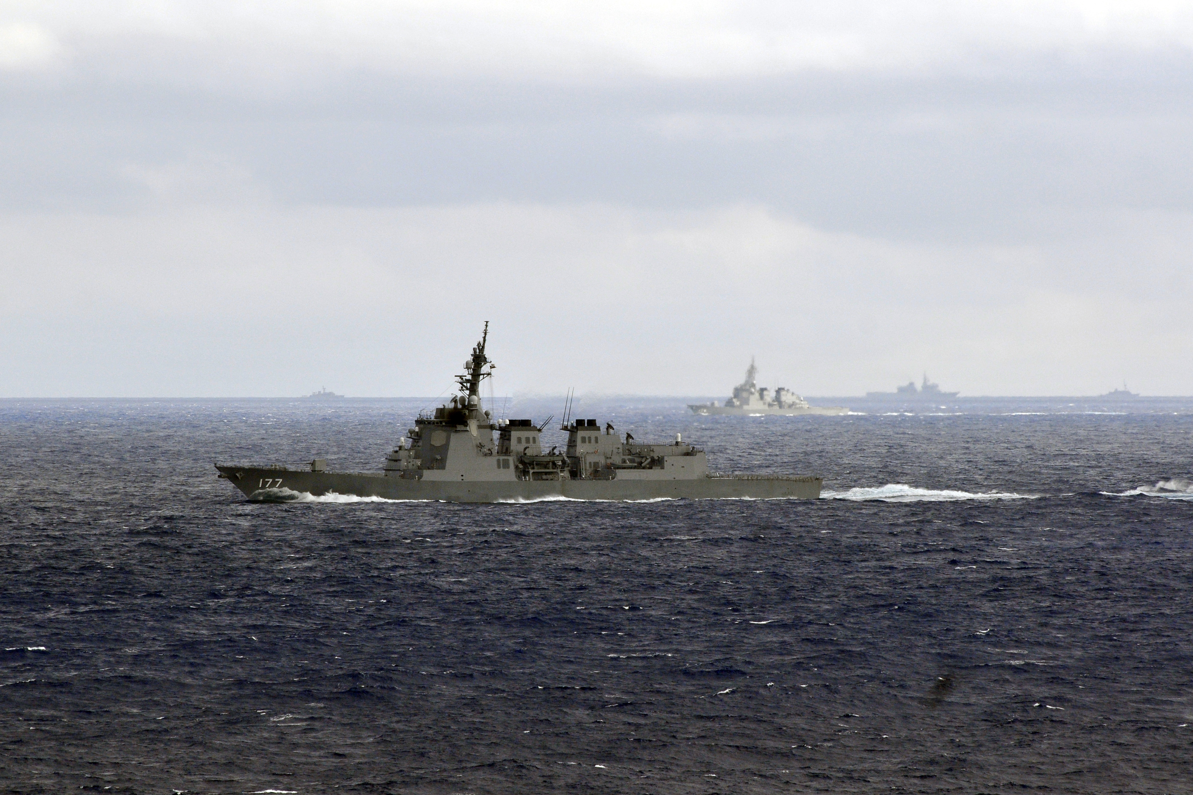 The Japan Maritime Self-Defense Force (JMSDF) guided-missile defense destroyer JDS Atago (DDG-177) maneuvers with other JMDSF and U.S. Navy ships belonging to the USS George Washington carrier strike group in 2011. US Navy Photo