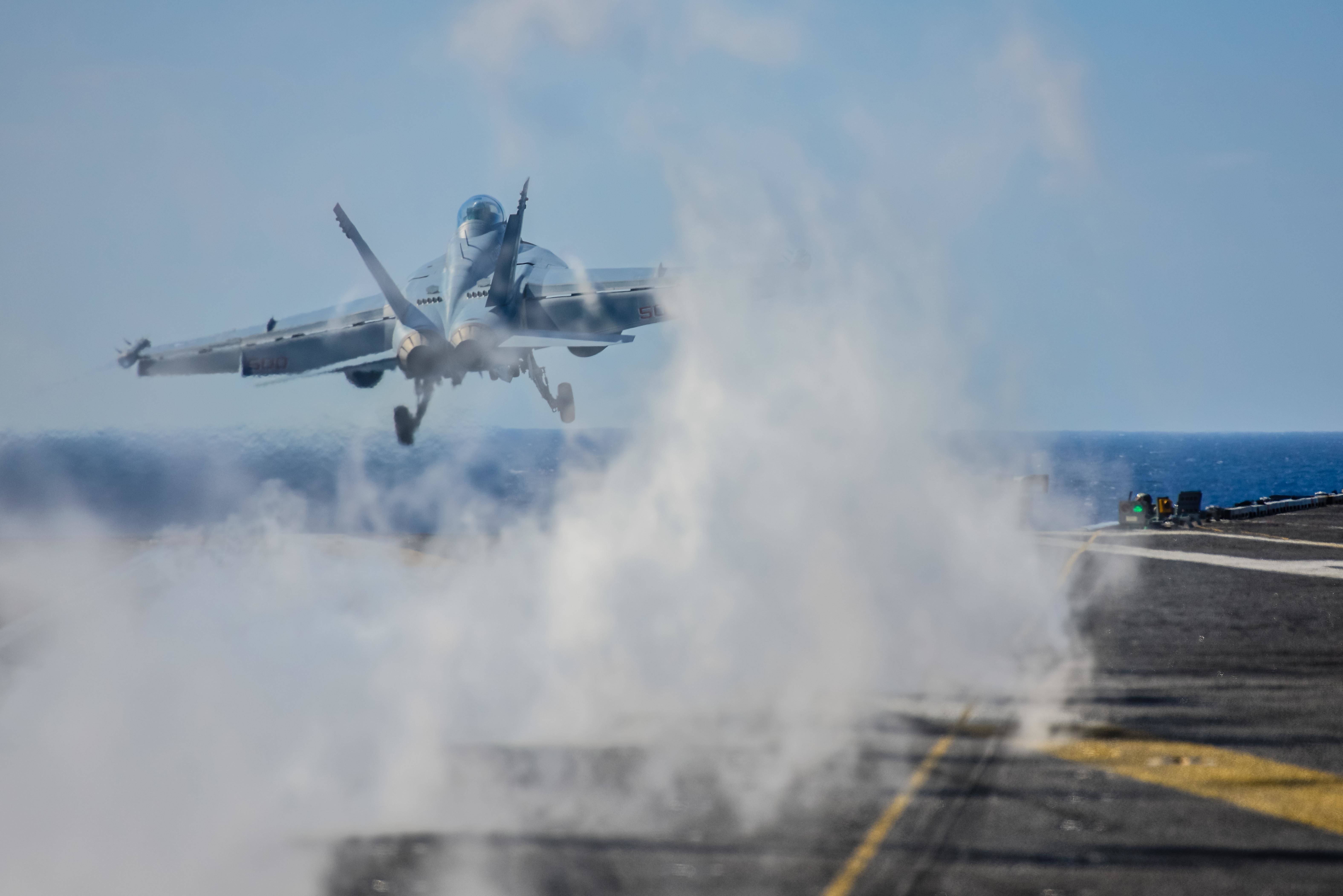 An E/A-18G Growler attached to the Wizards of Electronic Attack Squadron (VAQ) 133 launches from the flight deck of the aircraft carrier USS John C. Stennis (CVN 74) on April 20, 2015. US Navy photo.