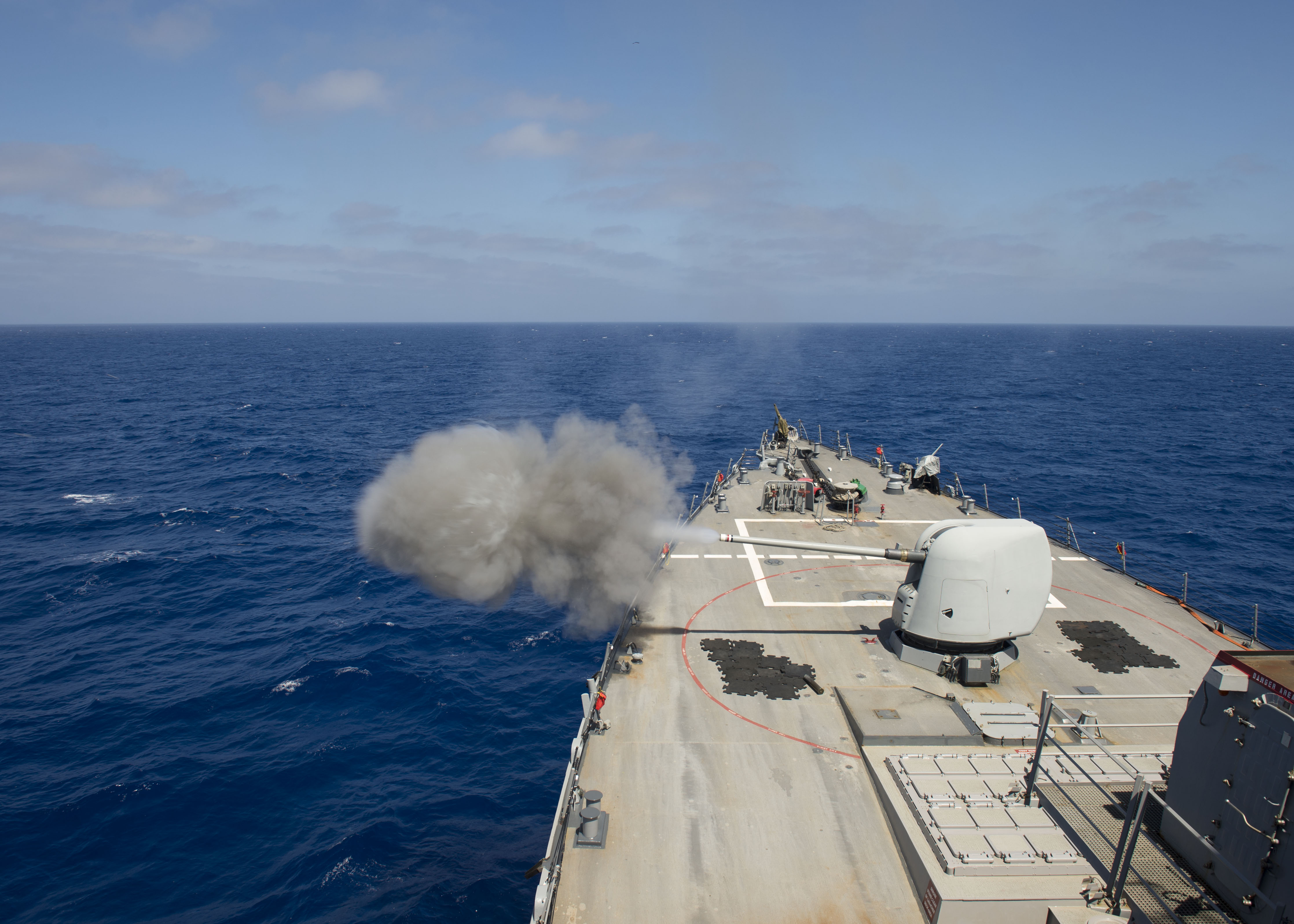 USS Ross (DDG-71) test fires the MK45 5-inch lightweight gun on April 30, 2015. US Navy Photo