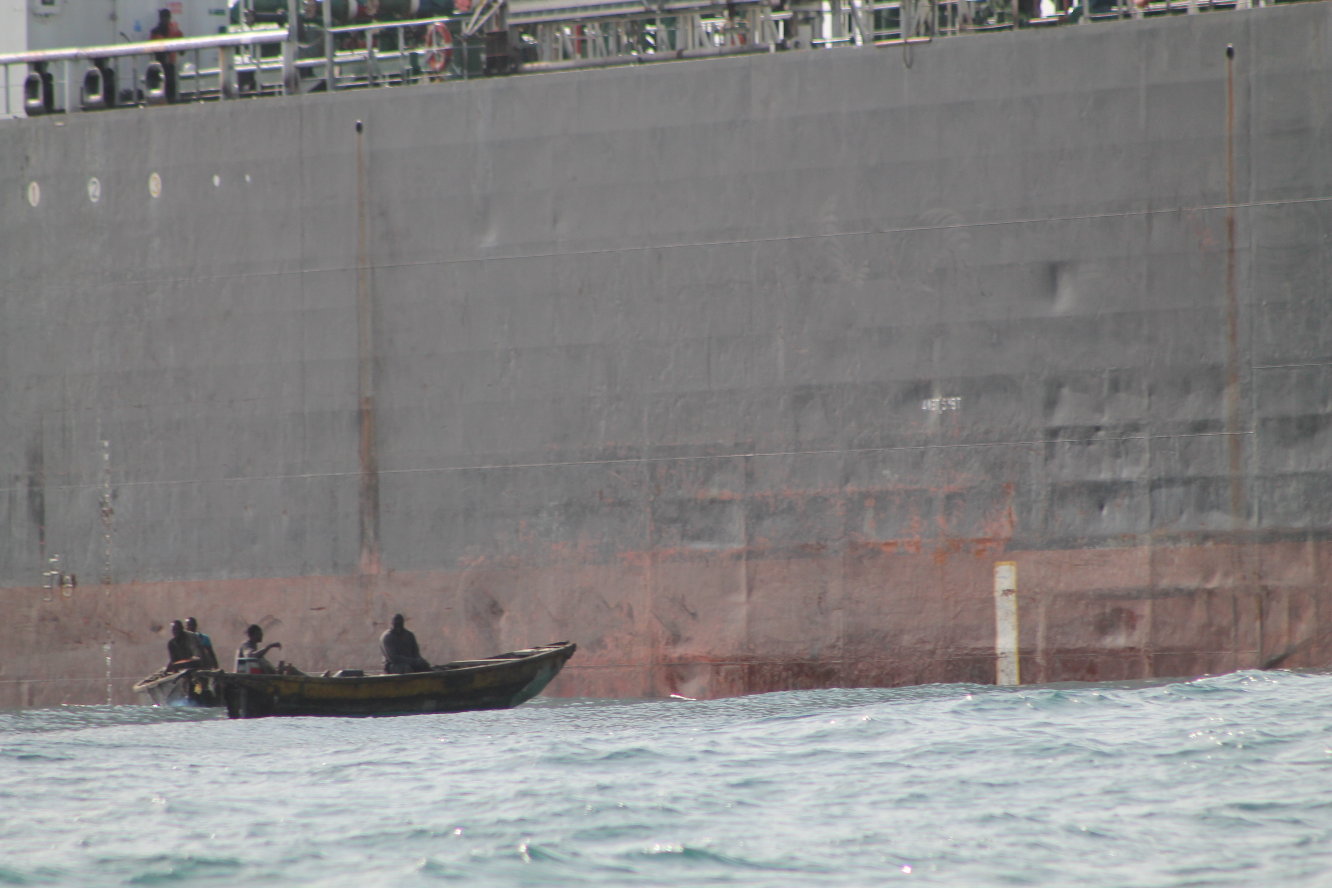 Close proximity of small boats, like this one on Lagos roads, often creates anxiety amongst ships’ crews and generates false piracy alerts. Photo by Dirk Steffen