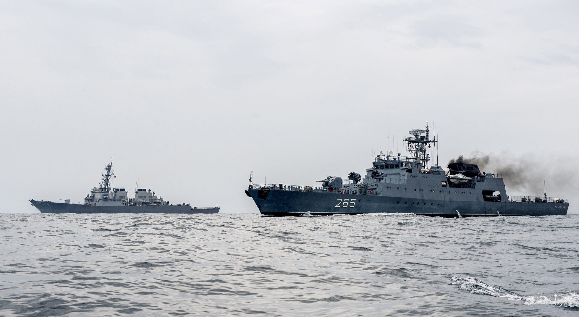 USS Porter (DDG-78), left, and the Romanian naval ship ROS Marcellariu (265), right, transit through the Black Sea during a passing exercise on July 14, 2015. US Navy Photo