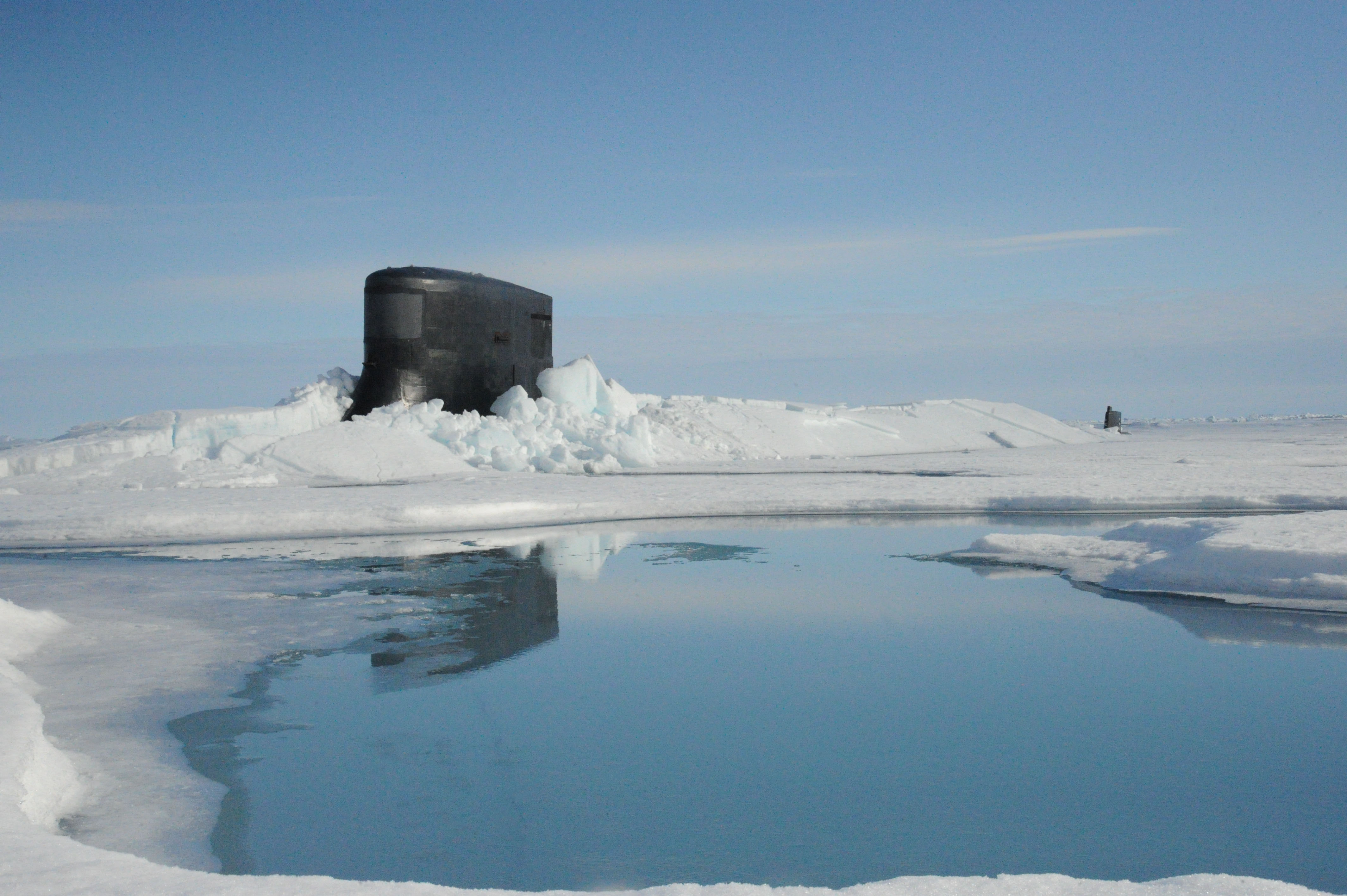Fast attack submarine USS Seawolf (SSN-21) surfaces through Arctic ice at the North Pole on July 30, 2015. US Navy Photo