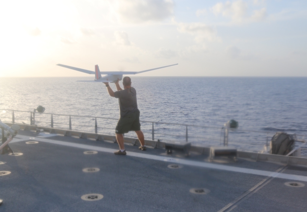 Unmanned aerial vehicle (UAV) aerial pilot and maintenance specialist, prepares to launch the Puma (RQ-20) into flight operations aboard the USNS Spearhead (JHSV 1) for Fleet Experimentation period two of Southern Partnership Station 2015 (SPS-JHSV 15), July 18. US Navy photo.