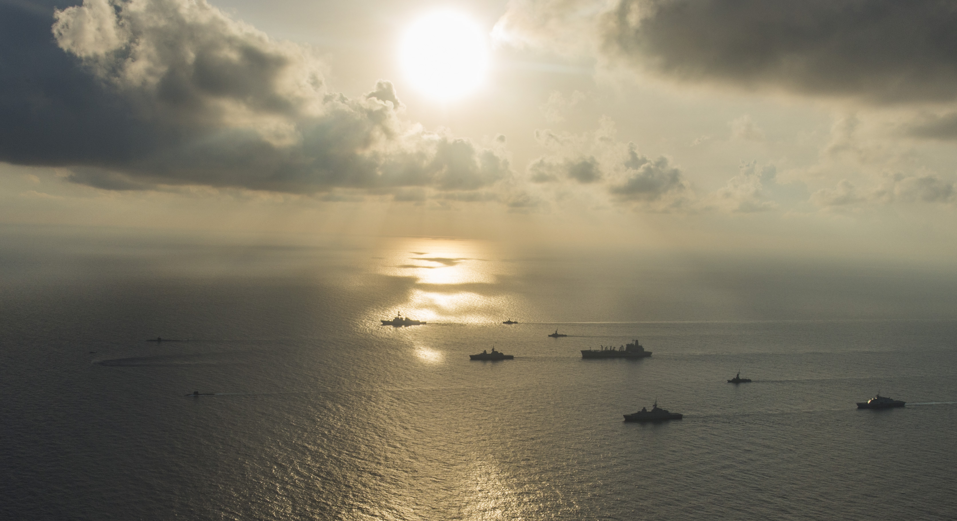 Ships and submarines from the Republic of Singapore navy and U.S. Navy gather in formation during the underway phase of Cooperation Afloat Readiness and Training (CARAT) Singapore 2015 on July 21, 2015. US Navy Photo
