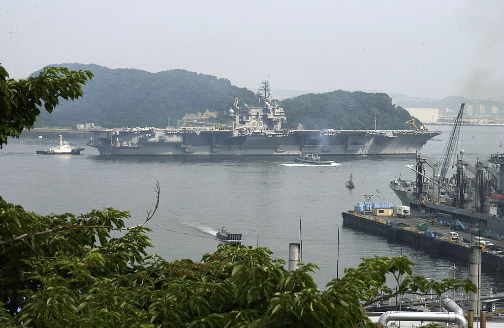 The former USS Kitty Hawk (CV-63) gets underway from its homeport at Yokosuka Naval Base, Japan in 2004. US Navy Photo