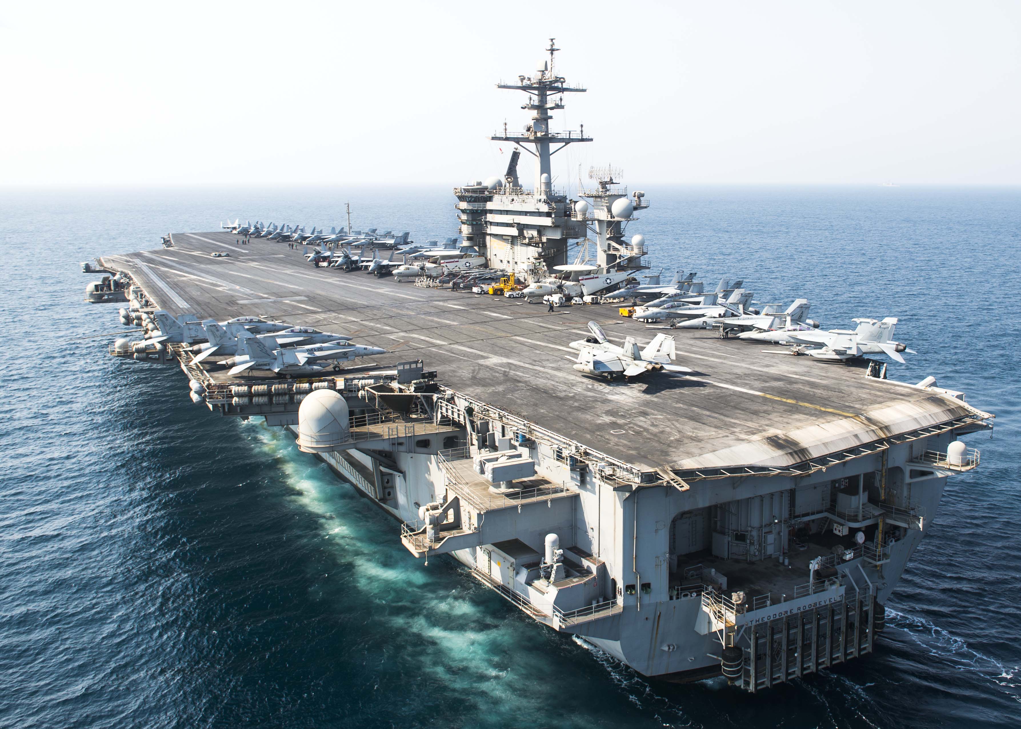 The aircraft carrier USS Theodore Roosevelt (CVN 71) transits the Arabian Gulf on Oct. 2, 2015. US Navy photo.