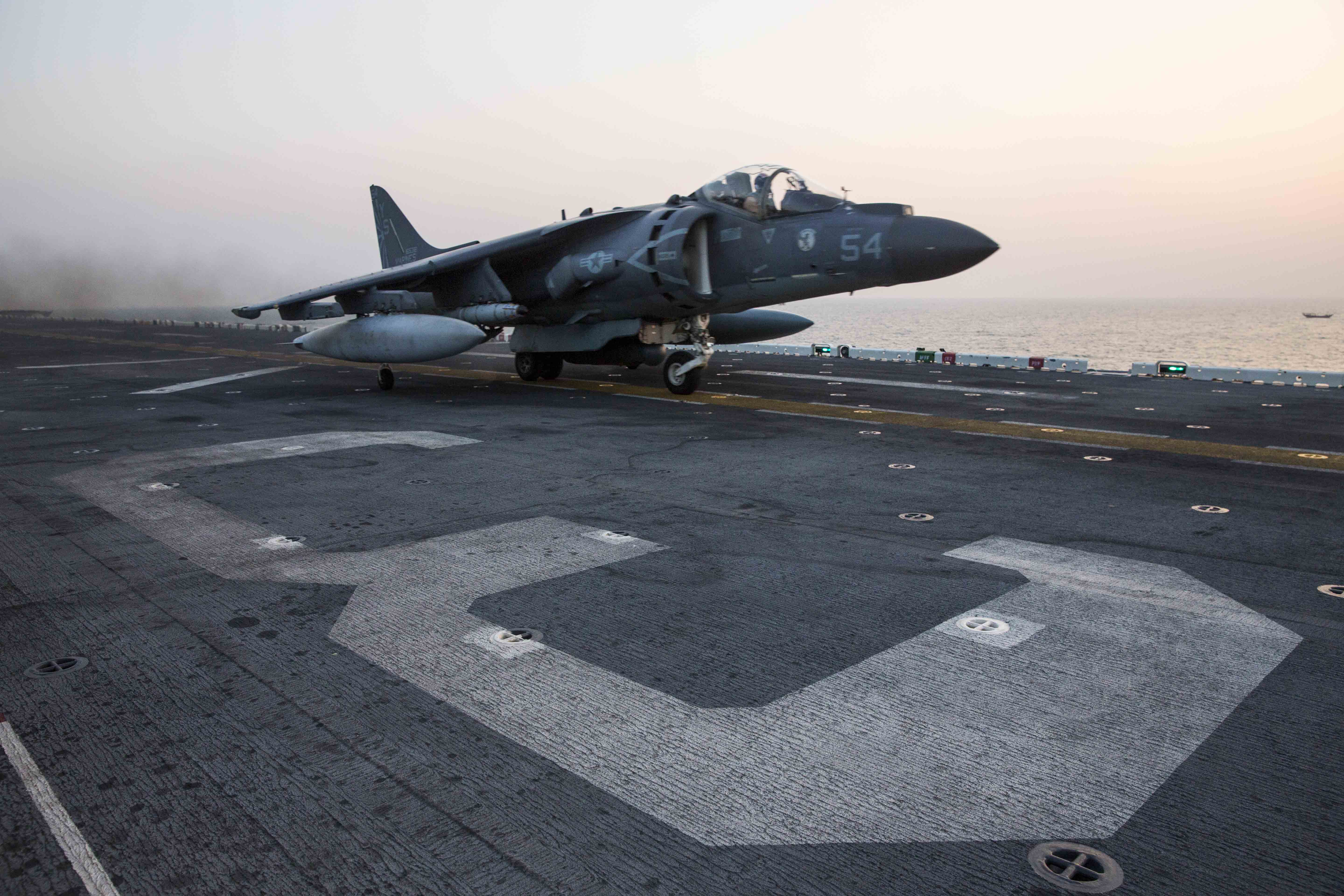 An AV-8B Harrier assigned to Marine Medium Tiltrotor Squadron (VMM) 162 (Reinforced), 26th Marine Expeditionary Unit (26th MEU), launches from the amphibious assault ship USS Kearsarge (LHD-3) on Nov. 19, 2015. US Navy Photo