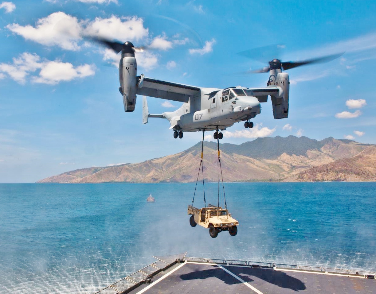 An MV-22B Osprey lifts a HUMVEE from the USNS Sacagawea April 11 at Subic Bay, Republic of the Philippines, during exercise Freedom Banner 2013. US Marine Corps Photo