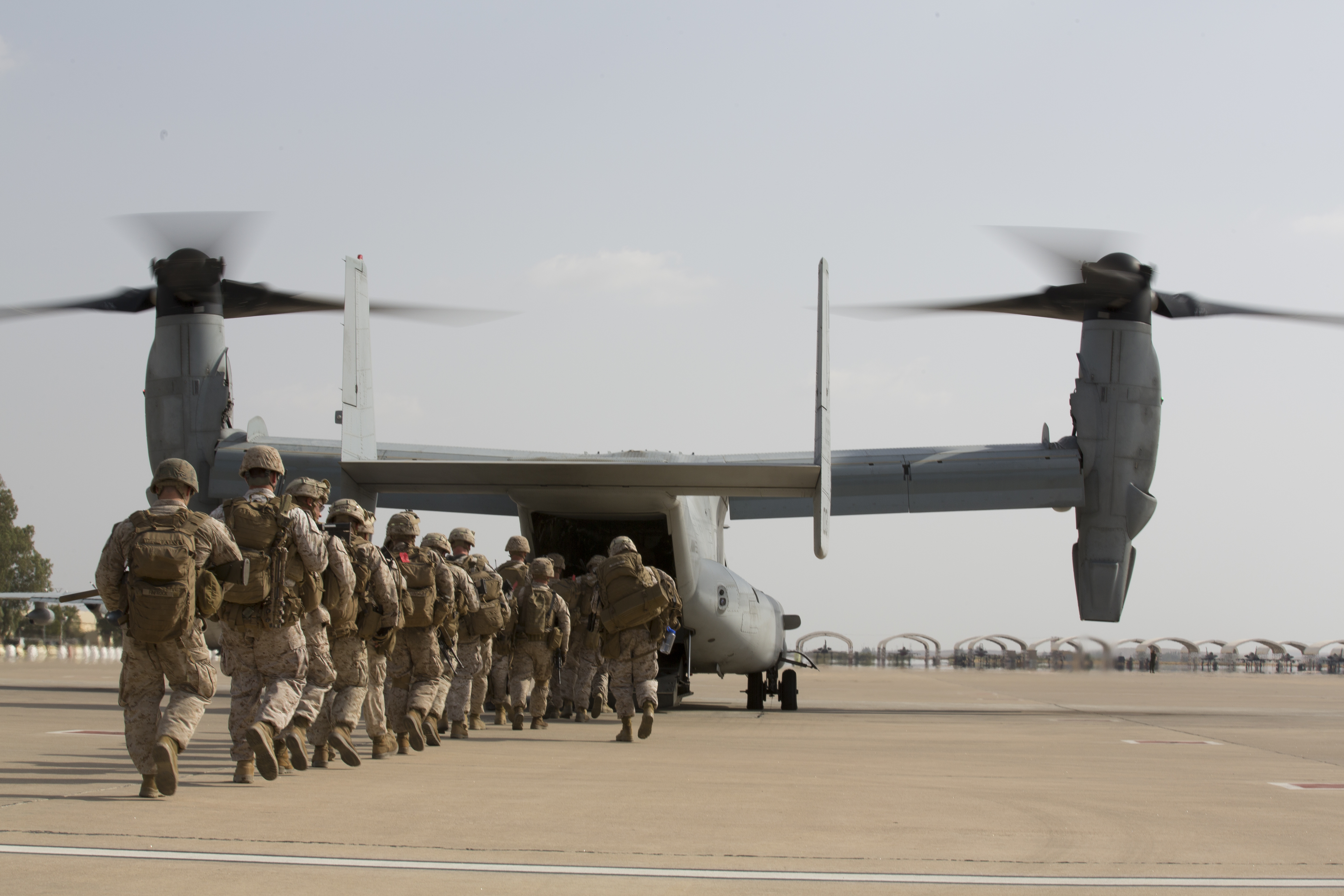 U.S. Marines with Special-Purpose Marine Air-Ground Task Force Crisis Response-Africa (SPMAGTF-CR-AF), board an MV-22B Osprey, during a crisis response drill on Morón Air Base, Spain, Aug. 3, 2015. The crisis response force’s mission requires them to have Marines ready to respond within six hours of an alert in support U.S. Africa Command. US Marine Corps photo.