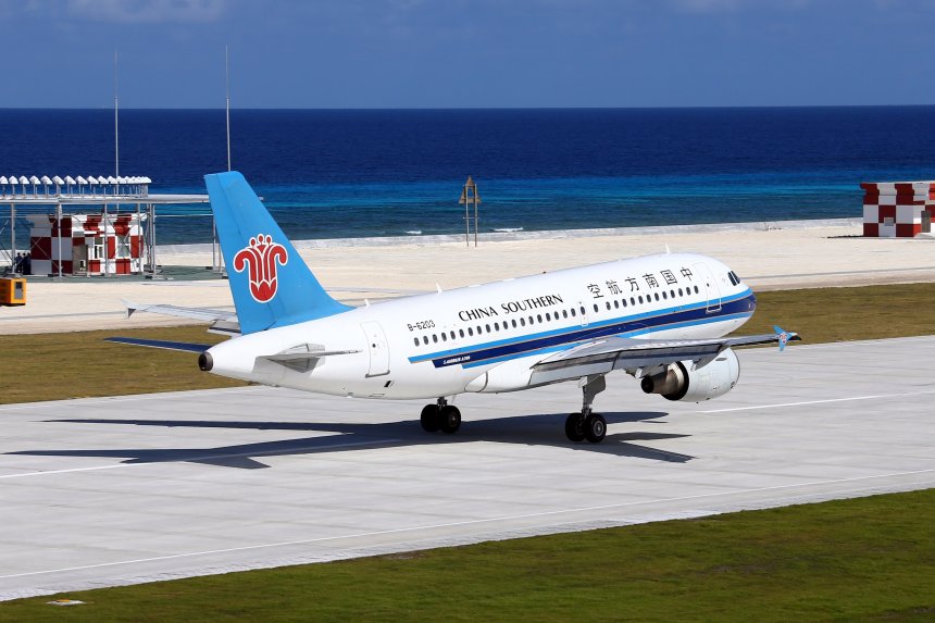 A Chinese airliner operating from China's airfield on Fiery Cross Reef in the South China sea in January. Xinhua Photo