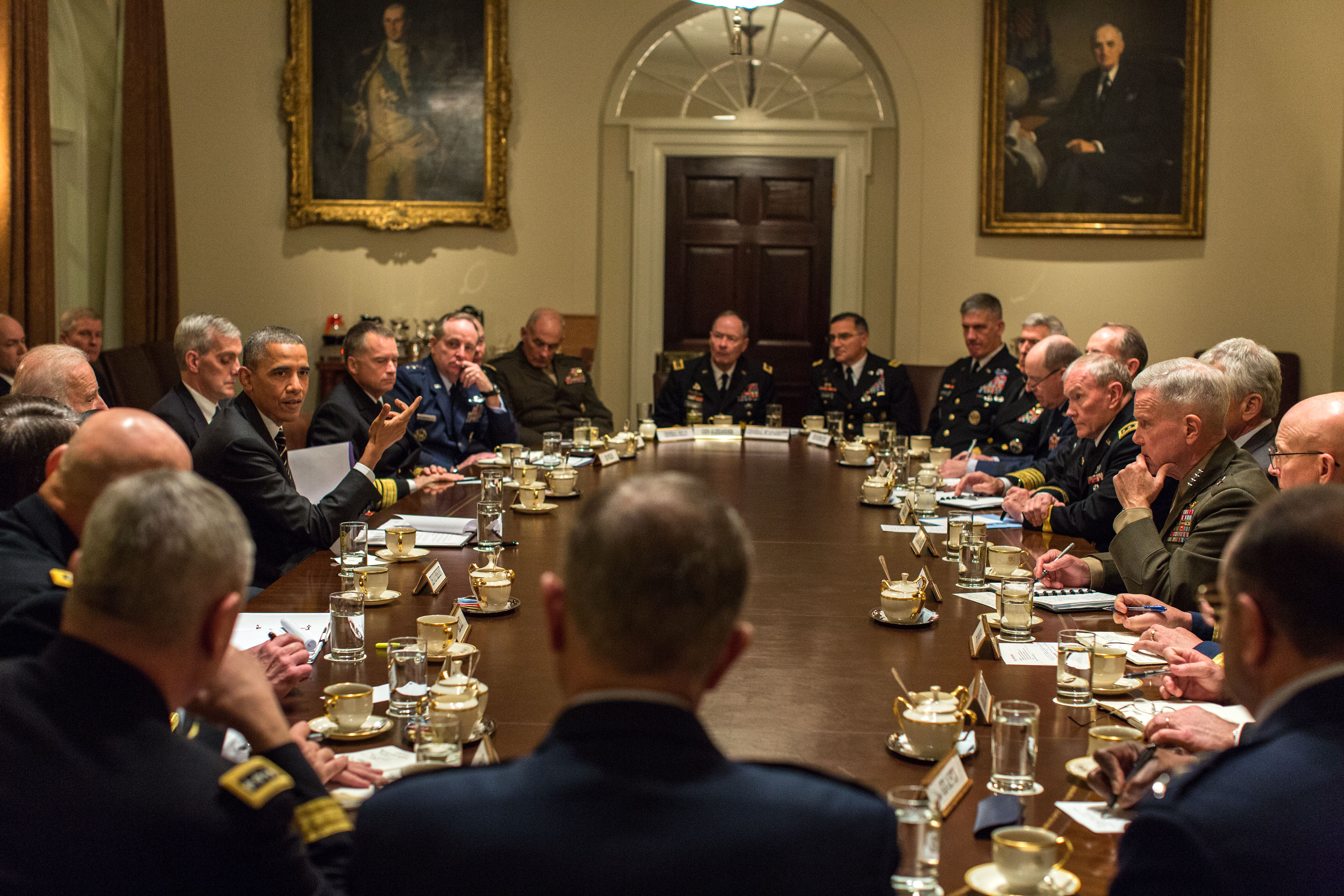 President Barack Obama and Vice President Joe Biden hold a meeting with Combatant Commanders and Military Leadership in the Cabinet Room of the White House on Nov. 12, 2013. White House Photo