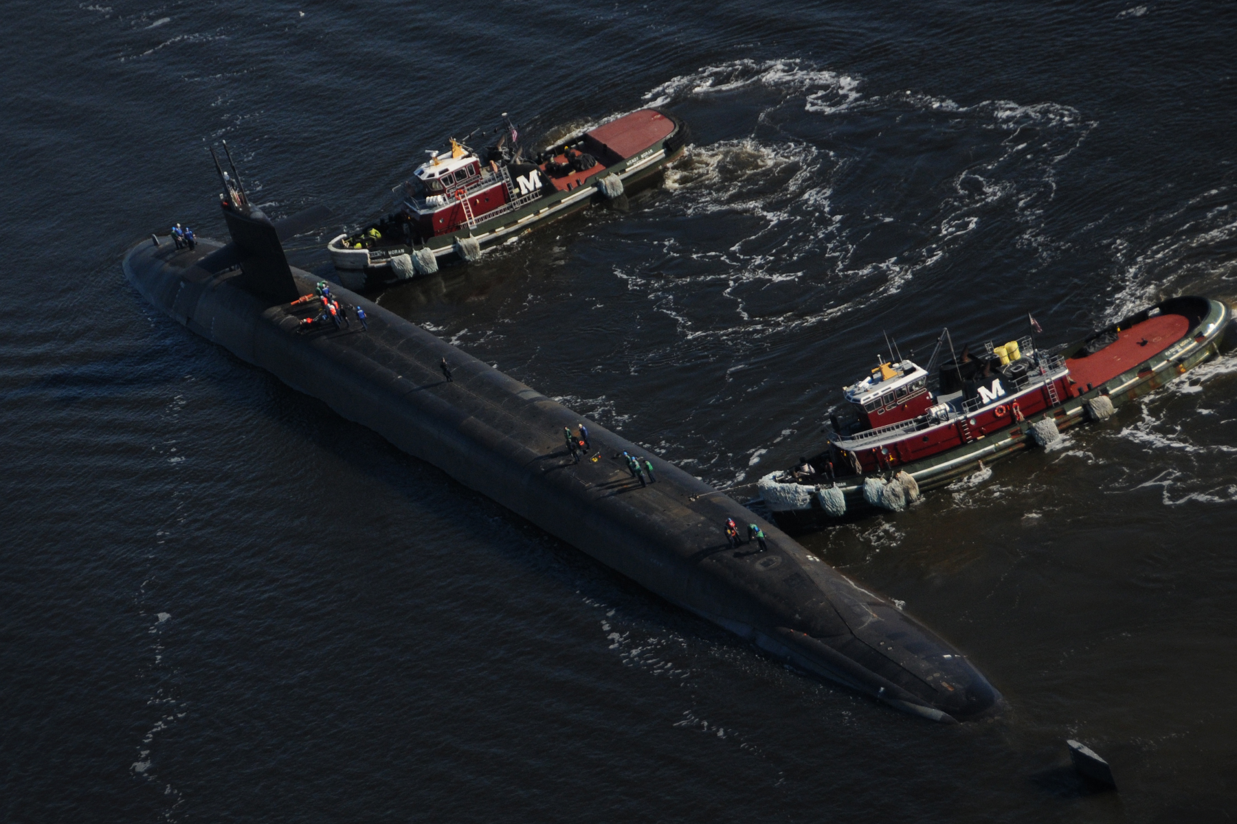 The Ohio-class ballistic-missile submarine USS West Virginia (SSBN 736) departs Norfolk Naval Shipyard in Portsmouth, Va. following an engineering refueling overhaul on Oct. 24, 2013. US Navy photo.