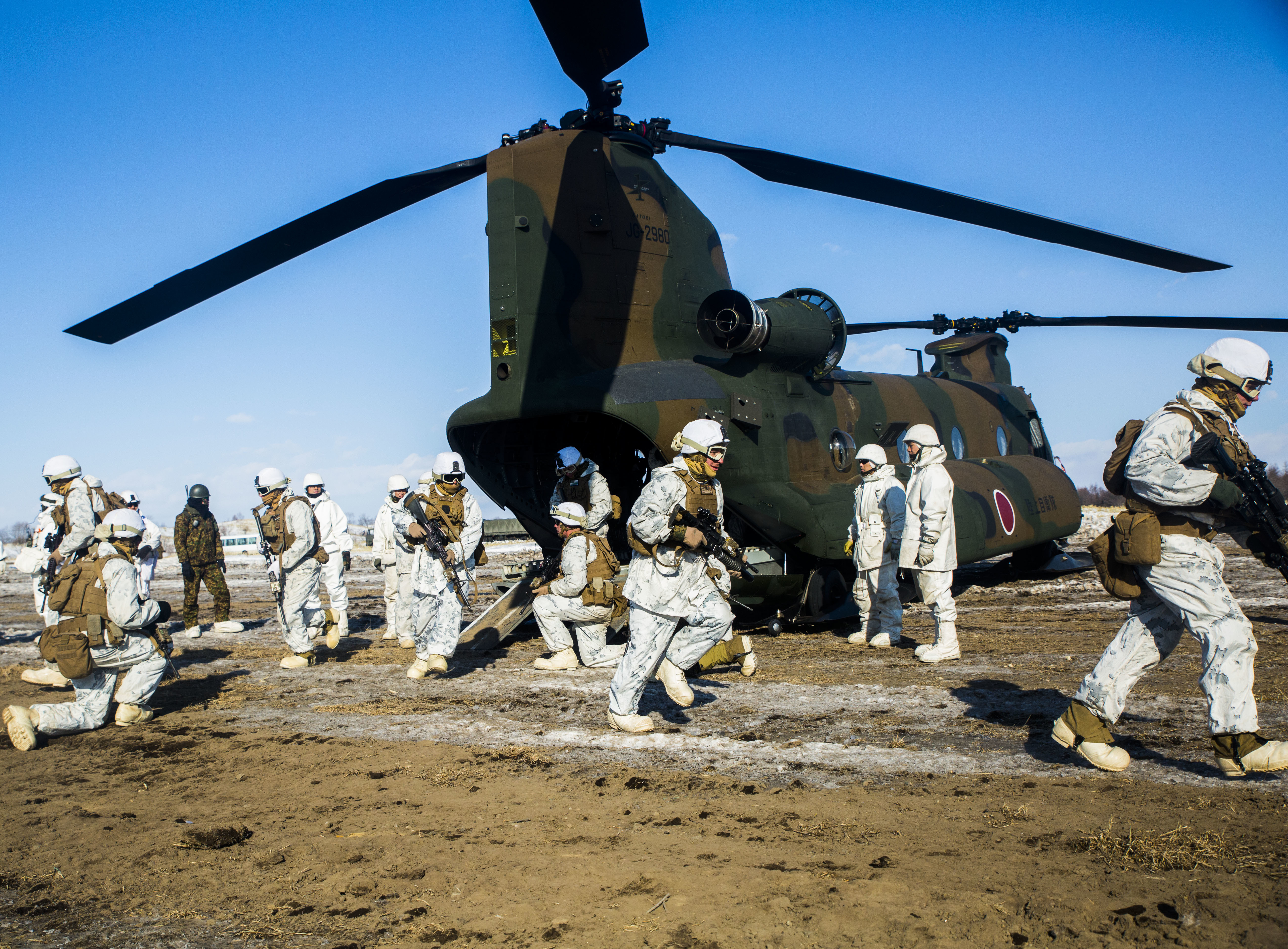 U.S. Marines from Kilo Company, 3rd Battalion, 5th Marine Regiment practice debarking from a Japan Ground Self Defense Force CH-47 Chinook during Forest Light 16-2 in Yausubetsu Training Area, Hokkaido, Japan, Feb. 1, 2016. US Marine Corps photo.