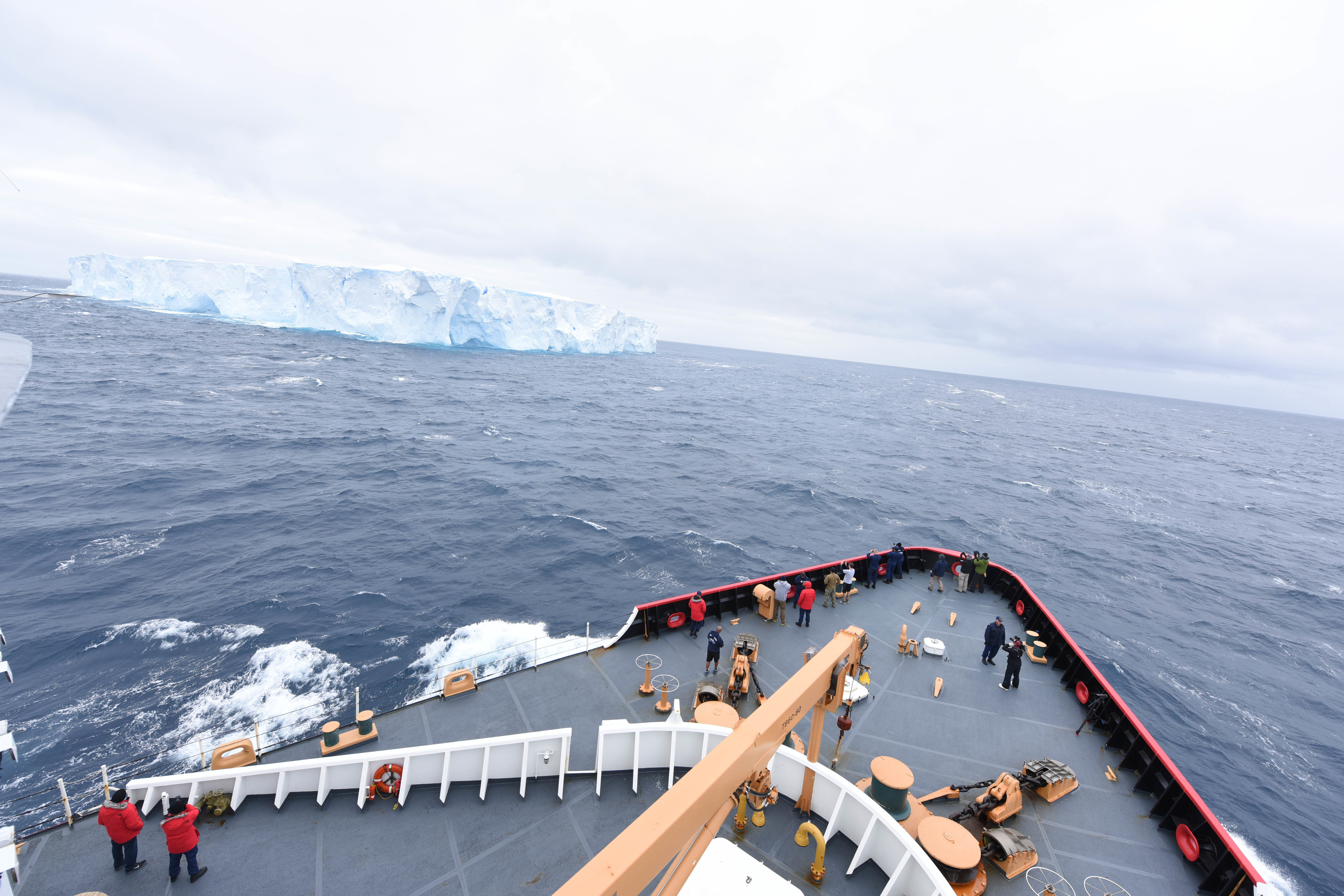 Passengers and the crew of CGC Polar Star gather to observe their first encounter with ice during Operation Deep Freeze 2016 in the Southern Ocean Jan. 3, 2016. The mission to resupply the National Science Foundation’s McMurdo Station, Antarctica, is one of the most difficult U.S. military peacetime missions due to the harsh environment. US Coast Guard photo.