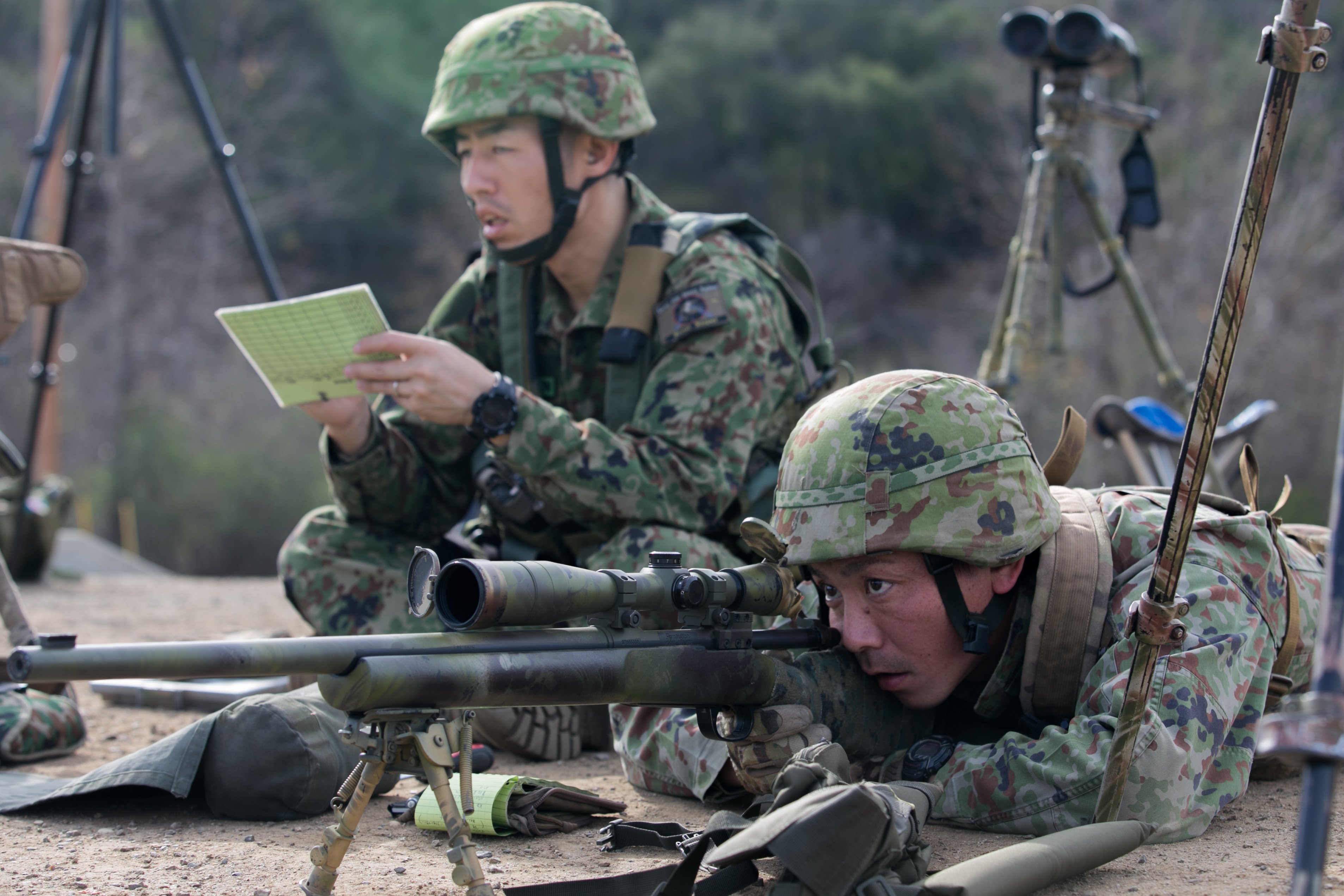 Japan Ground Self-Defense Force (JGSDF) soldiers measure range distances with their M24 sniper rifles at the unknown distance live-fire event during Exercise Iron Fist 2016 aboard Marine Corps Base Camp Pendleton, Calif. US Marine Corps Photo