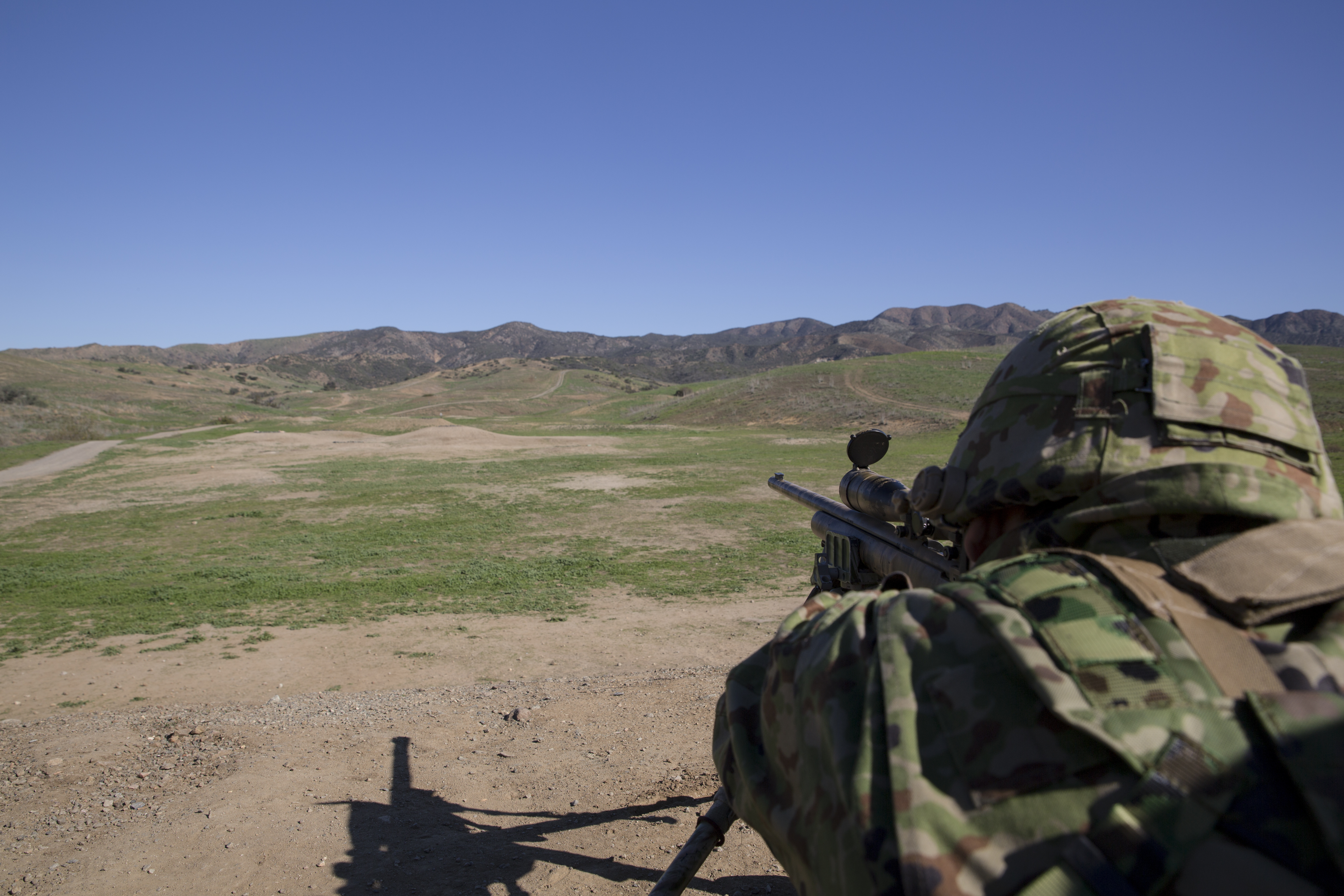 A Japan Ground Self-Defense Force soldier fires at a target while his spotter observes the impact, during an unknown distance course of fire, aboard Marine Corps Base Camp Pendleton, Calif., Jan 28, 2016. US Marine Corps Photo