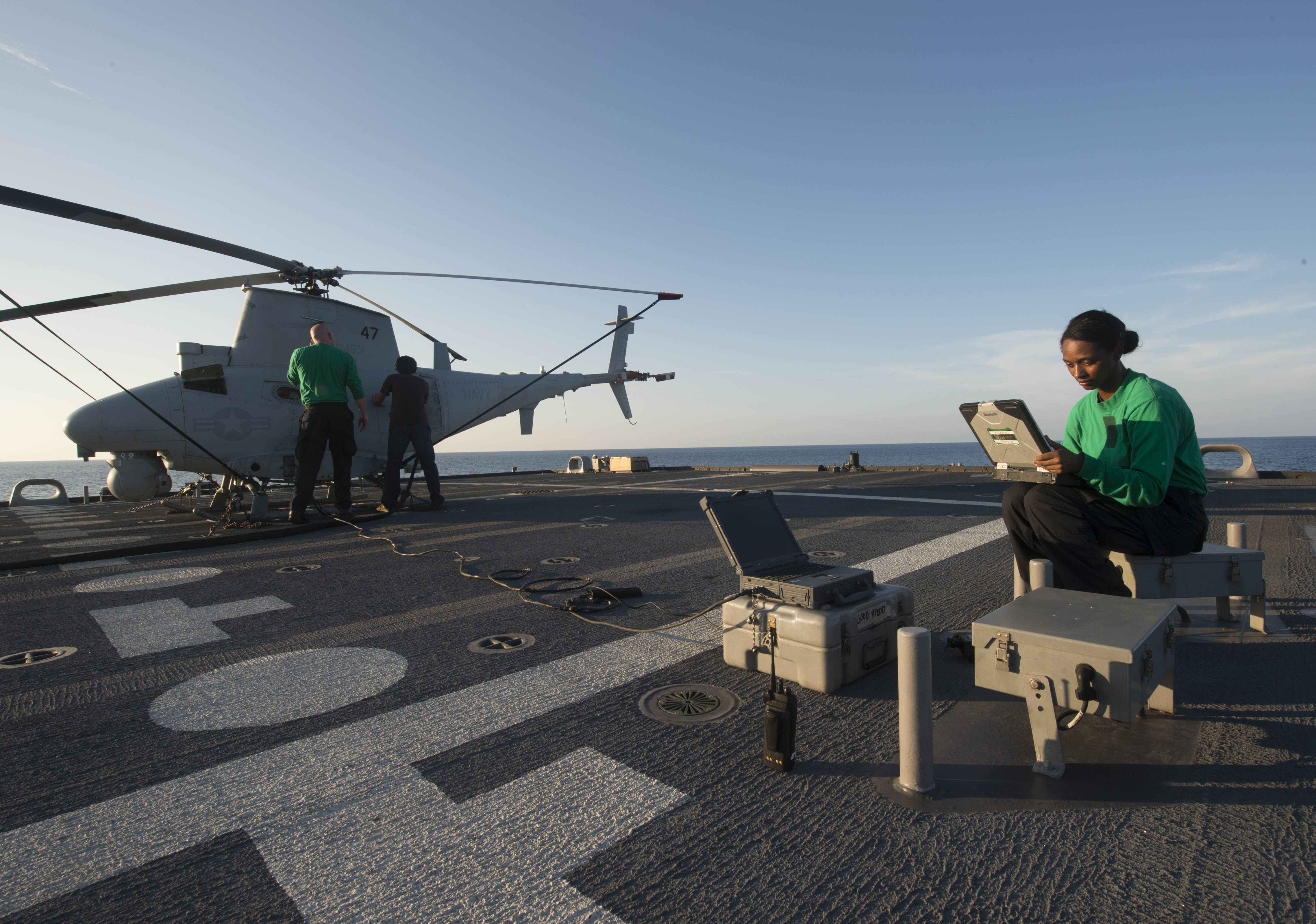 Sailors aboard the littoral combat ship USS Fort Worth (LCS 3) prepare to launch an MQ-8B Fire Scout unmanned aircraft system on Aug. 15, 2015. US Navy photo.