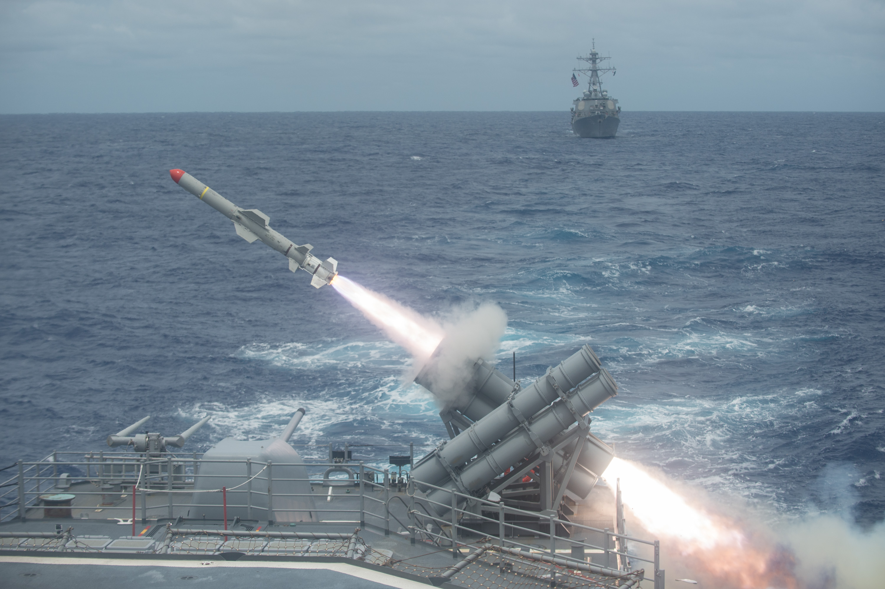 A Harpoon anti-surface missile is launched from the Ticonderoga-class guided-missile cruiser USS Shiloh (CG-67) in 2014. US Navy Photo