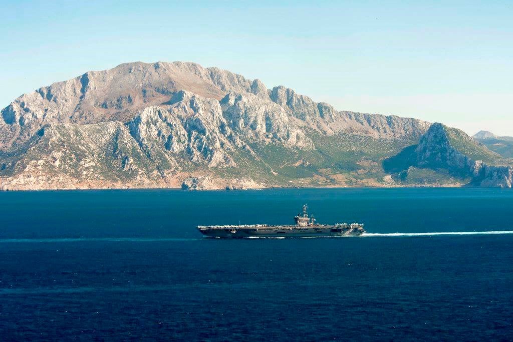 The aircraft carrier USS Dwight D. Eisenhower (CVN 69) transits through the Strait of Gibraltar into the Mediterranean Sea on June 13, 2016. US Navy photo.