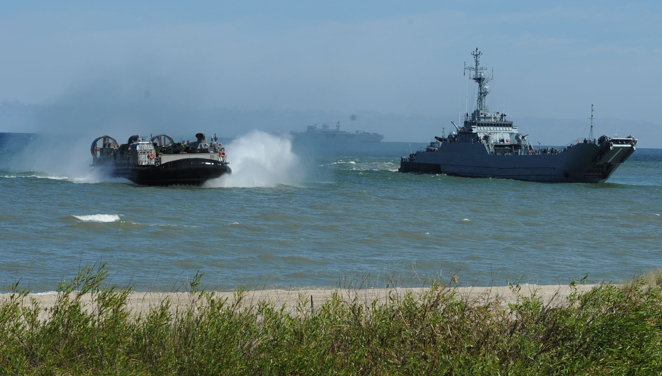 Allied forces practice amphibious assault near Ustka, northern Poland, on 17 June 2015 as part of BALTOPS 2015. NATO Photo