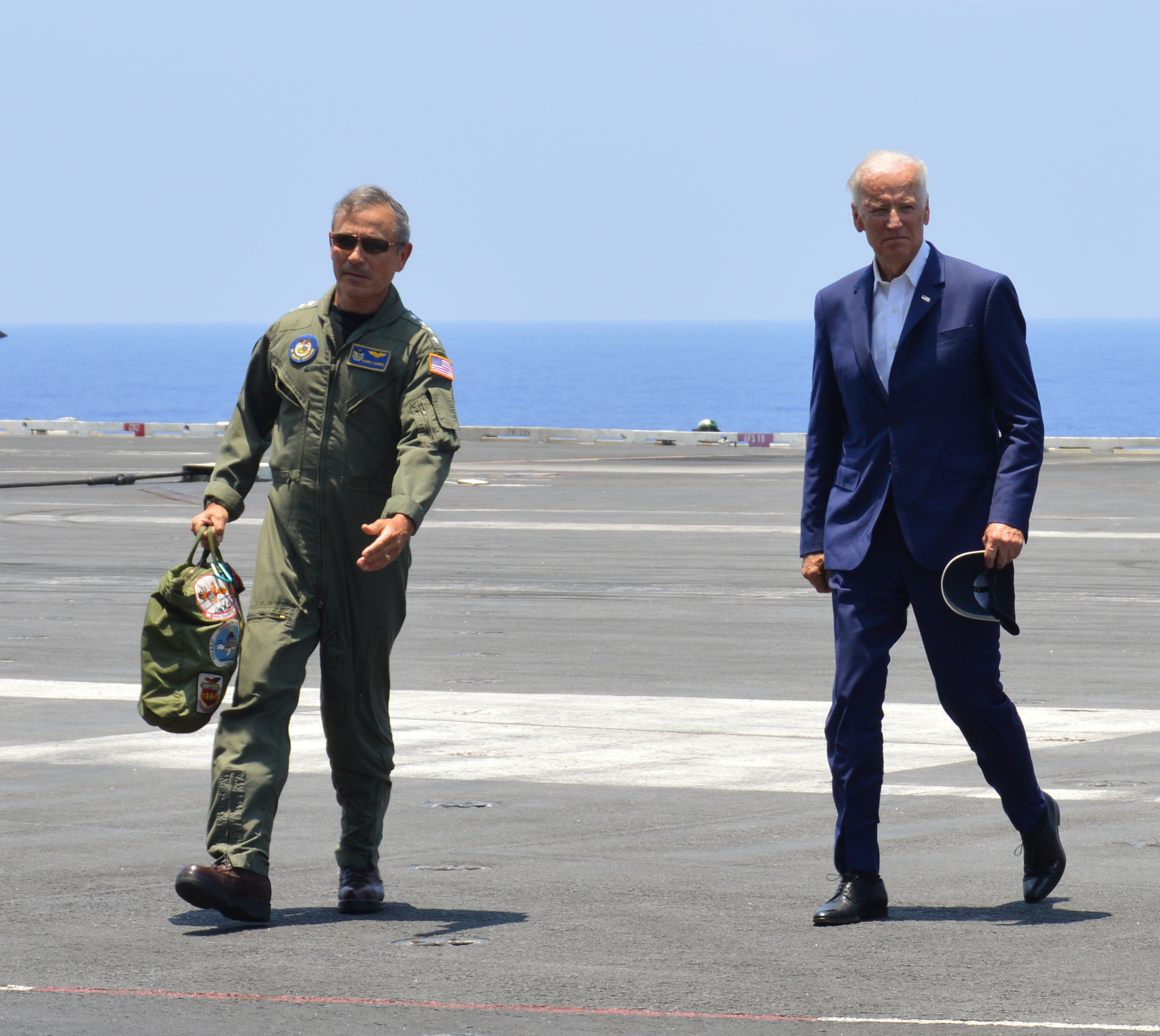 U.S. Pacific Command Commander Adm. Harry Harris and Vice President Joe Biden arrive on USS John C. Stennis onJuly 14, 2016. USNI News Photo