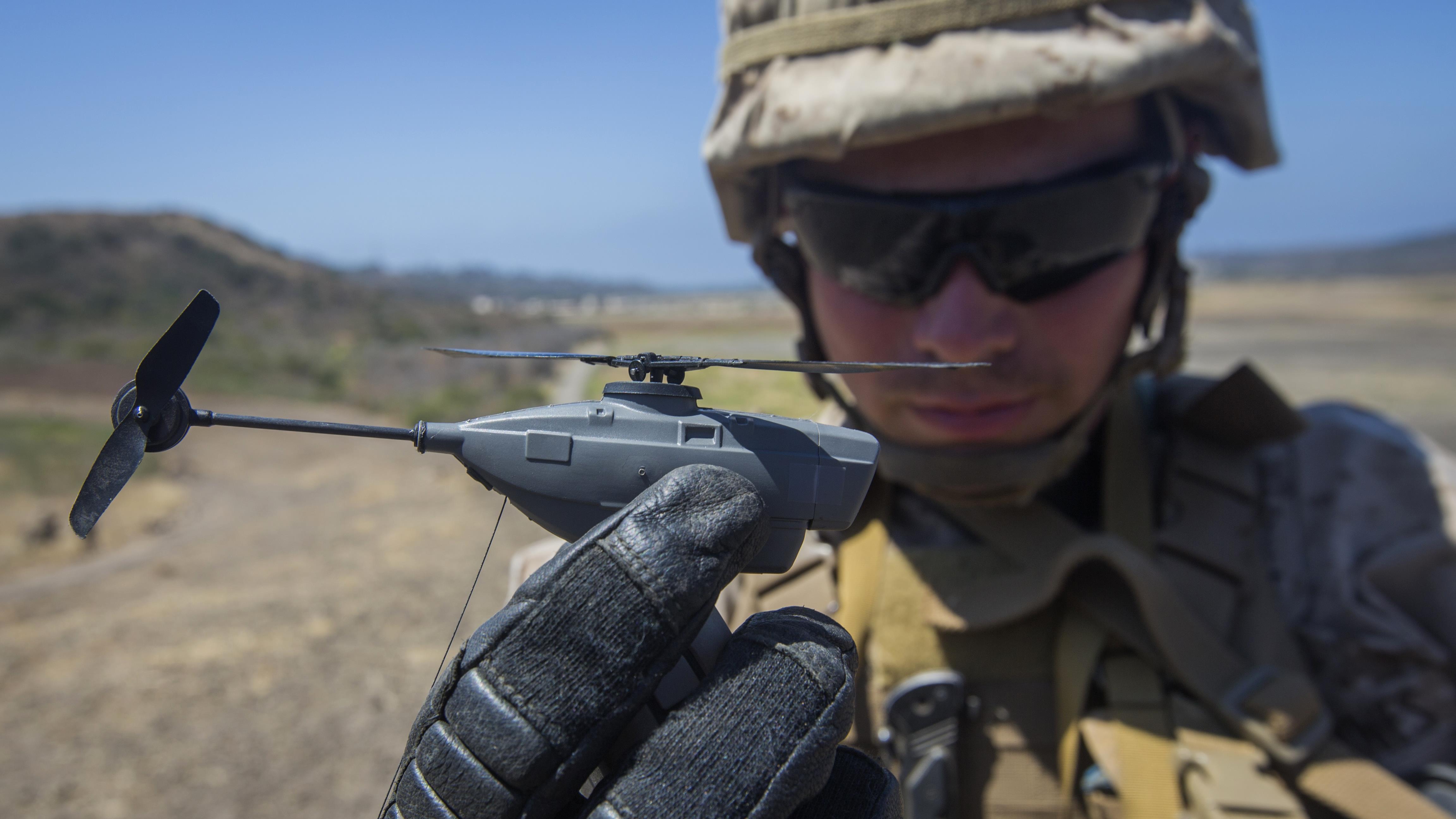 U.S. Marine Lance Cpl. Cesar Salinas, an infantry Marine with Kilo Company, 3rd Battalion, 5th Marine Regiment, displays the PD-100 Black Hornet after an exercise for Marine Corps Warfighting Laboratory's Marine Air-Ground Task Force Integrated Experiment on Marine Corps Base Camp Pendleton, California, July 9, 2016. US Marine Corps Photo