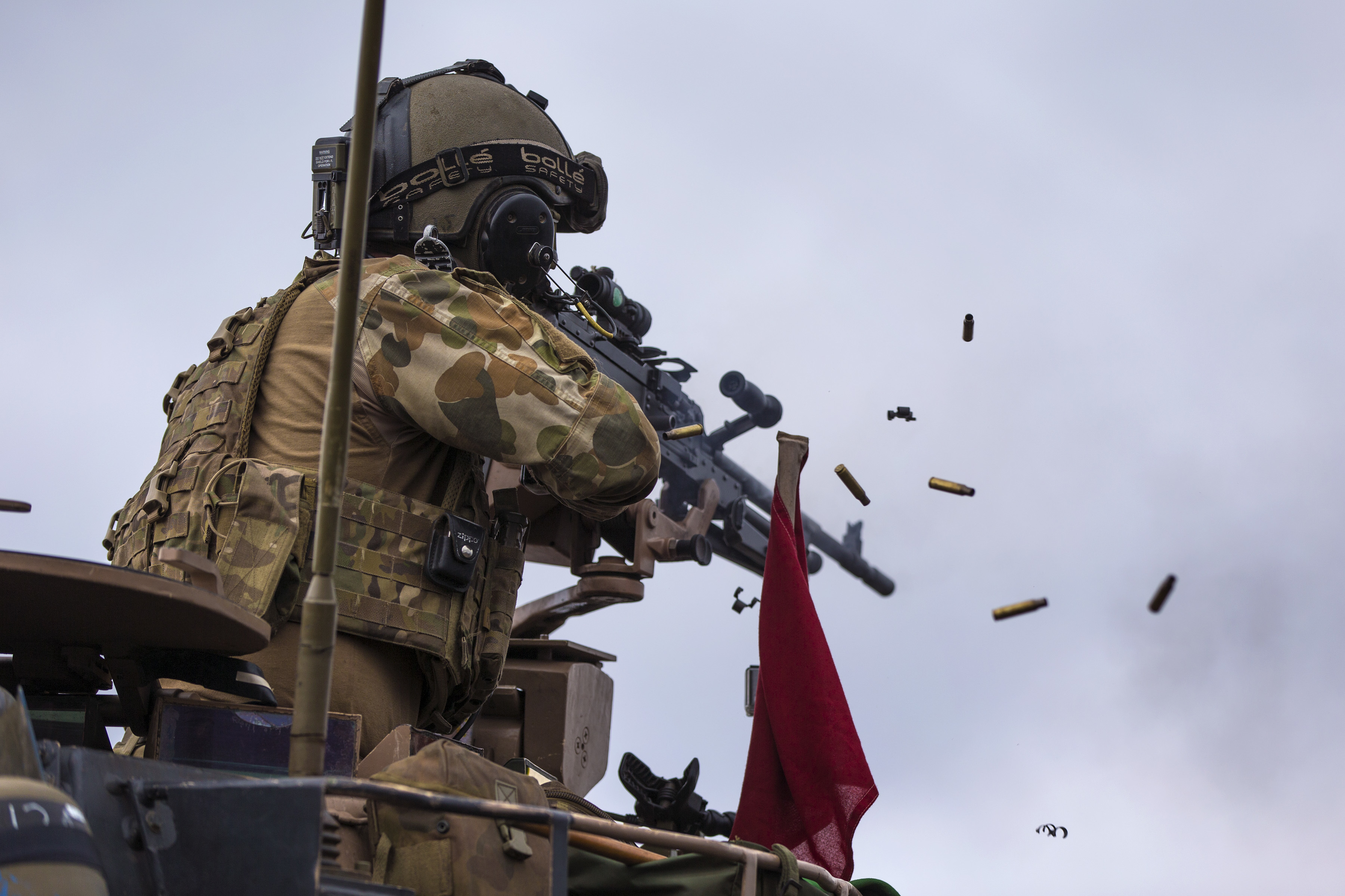 Australian Army Troop Sergeant Nick O'Halloran from the 2nd Cavalry Regiment engages targets with a MAG-58 machine gun during a live fire range practice on Exercise Rim of the Pacific 2016. Australian Defence Force Photo