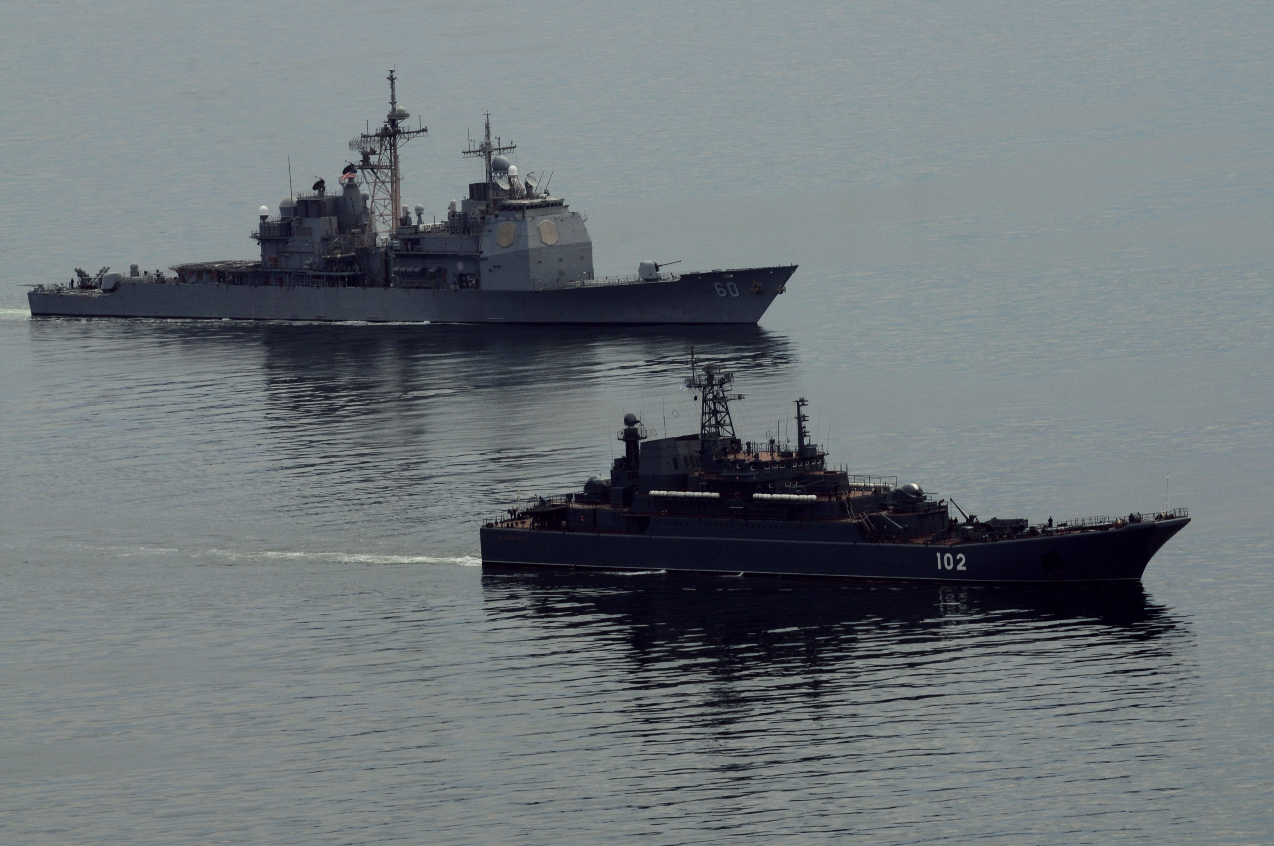 USS Normandy (CG-60), left, and the Russian amphibious ship RFS Kaliningrad (LSTM 102) conduct anti-piracy training during the Baltic Operations (BALTOPS) 2012 exercise. US Navy Photo