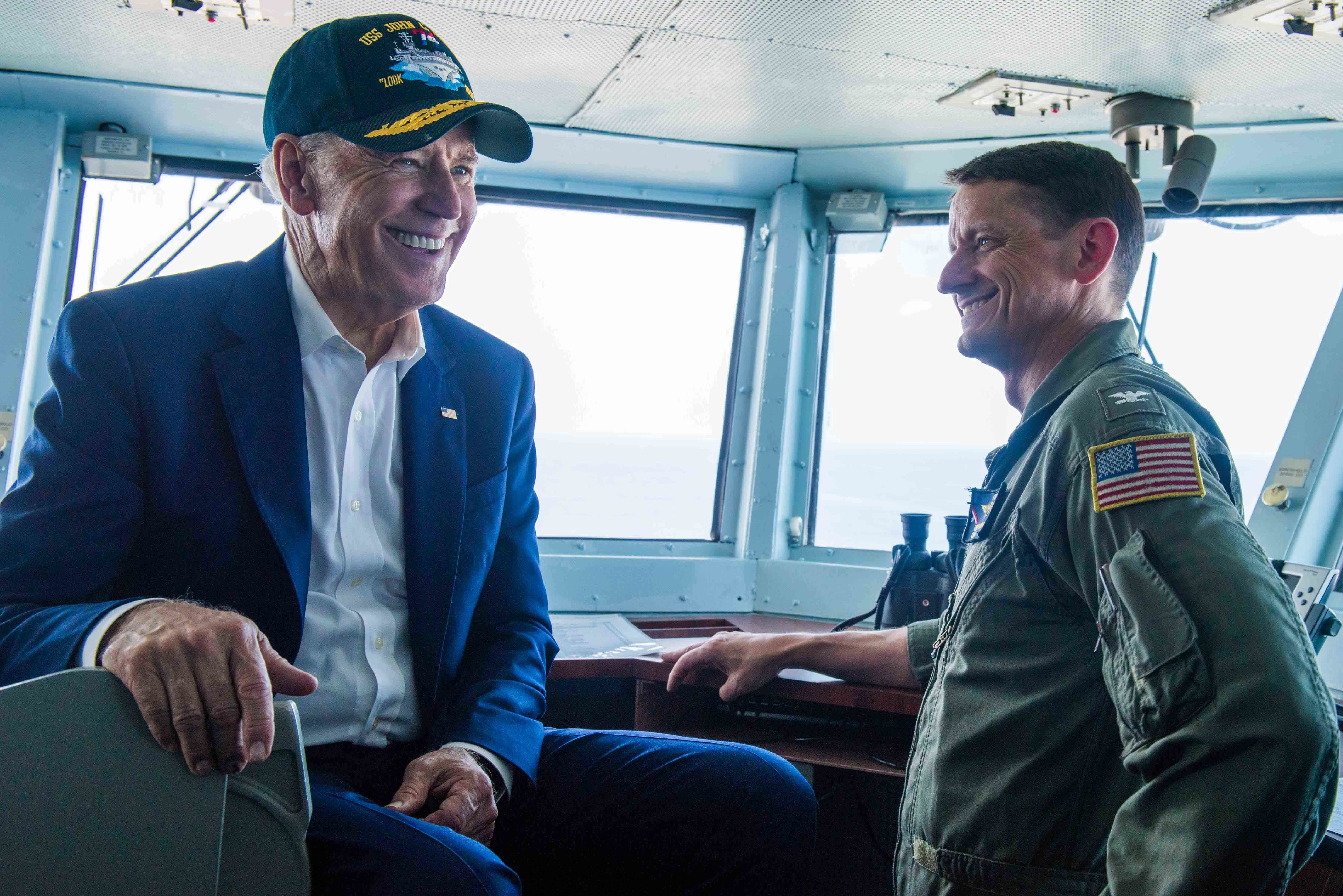 Vice President Joe Biden meets with Capt. Greg Huffman, USS John C. Stennis’ (CVN 74) commanding officer, on the bridge aboard USS John C. Stennis during the Rim of the Pacific maritime exercise on July 14, 2016. US Navy photo.