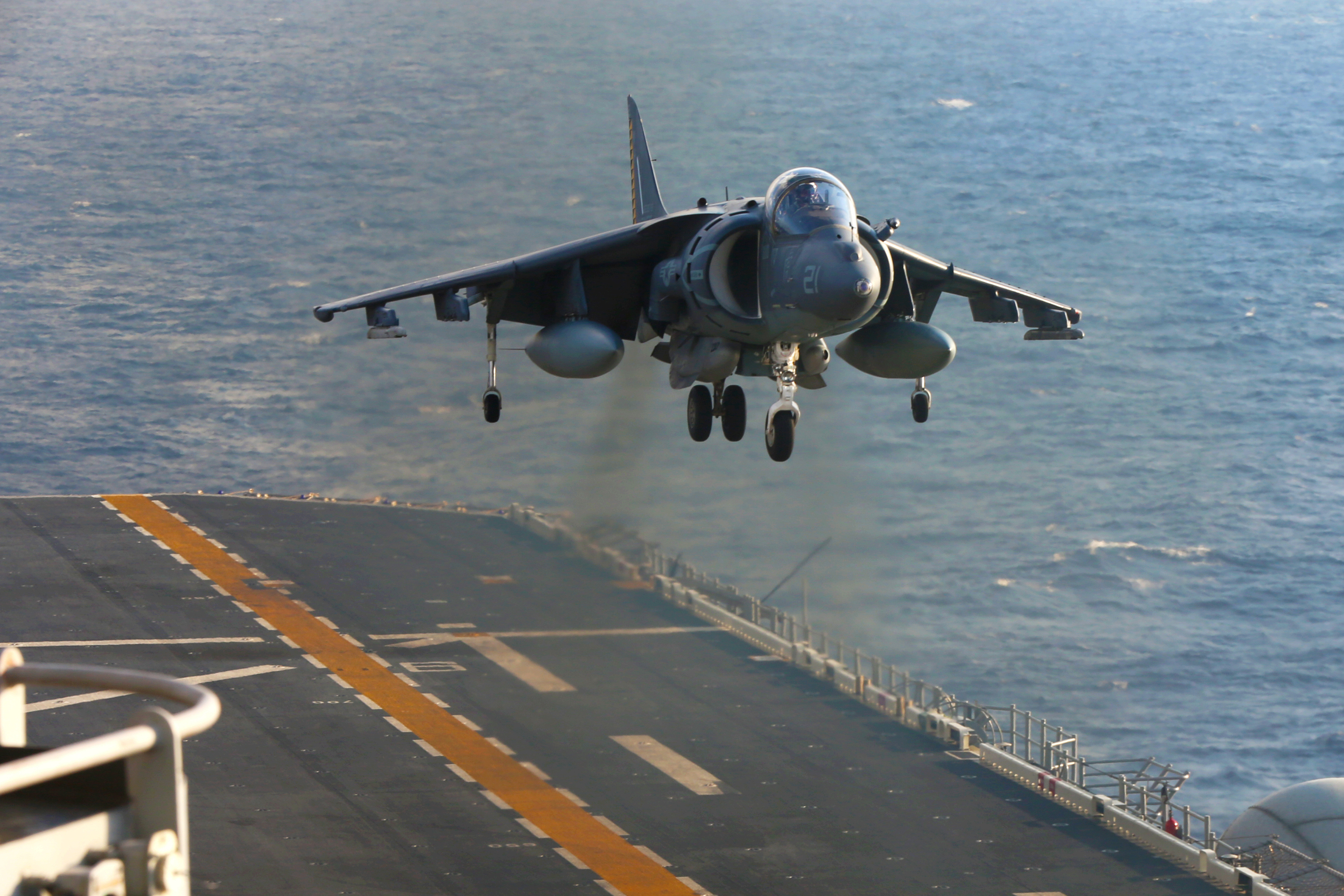 An AV-8B Harrier with Marine Medium Tiltrotor Squadron 262 (Reinforced), 31st Marine Expeditionary Unit, prepares to land aboard the USS Bonhomme Richard (LHD-6), at sea, Aug. 27, 2016. US Marine Corps photo.