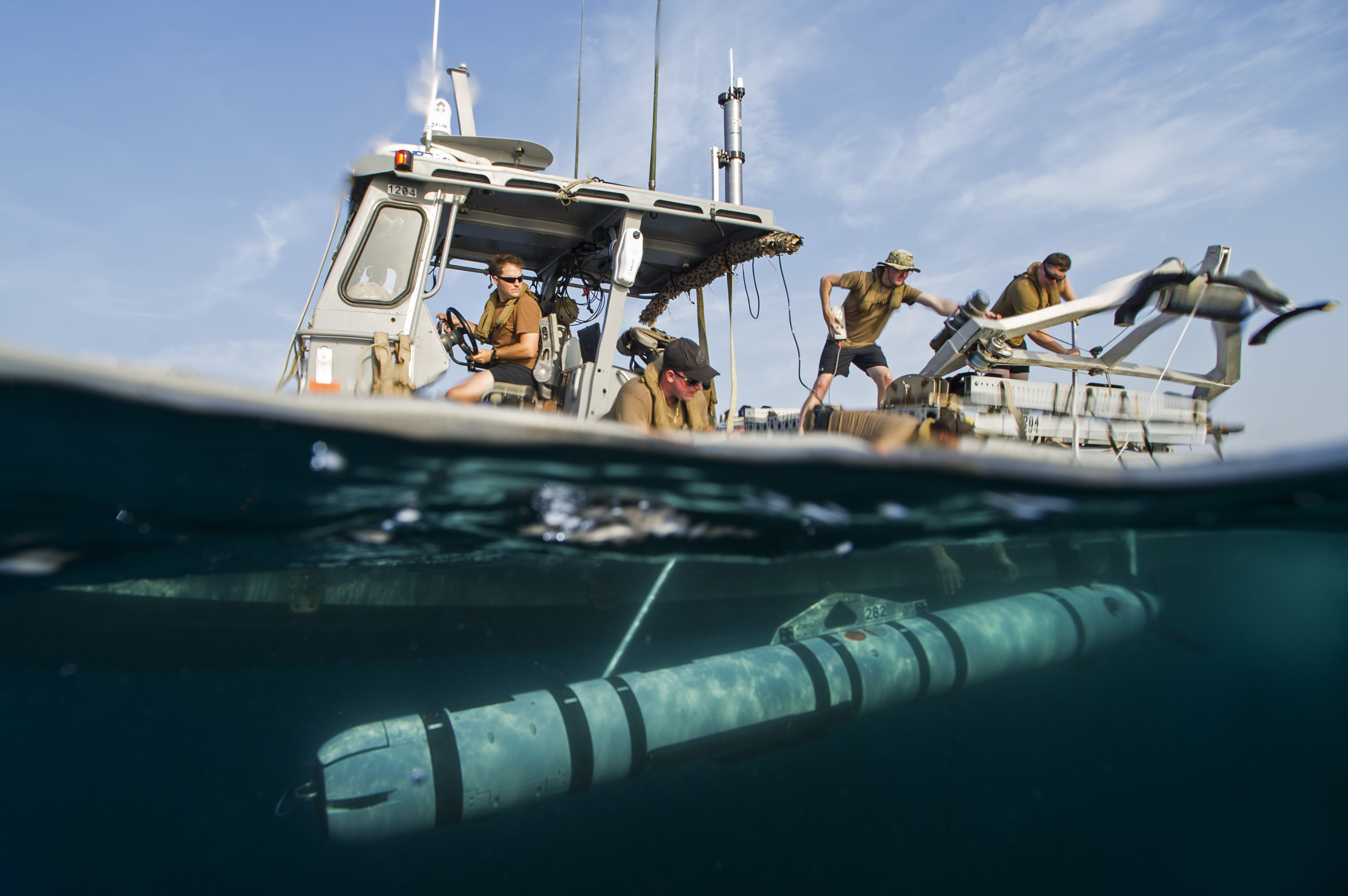 Crew members from Task Group 56.1 launch a MK 18 MOD 2 unmanned underwater vehicle from a rigid-hull inflatable boat during Squadex 2016, on Aug. 2, 2016, in the Persian Gulf. Squadex 2016 demonstrates U.S./U.K. mine detection capabilities in the U.S. 5th Fleet area of operations. US Navy photo.