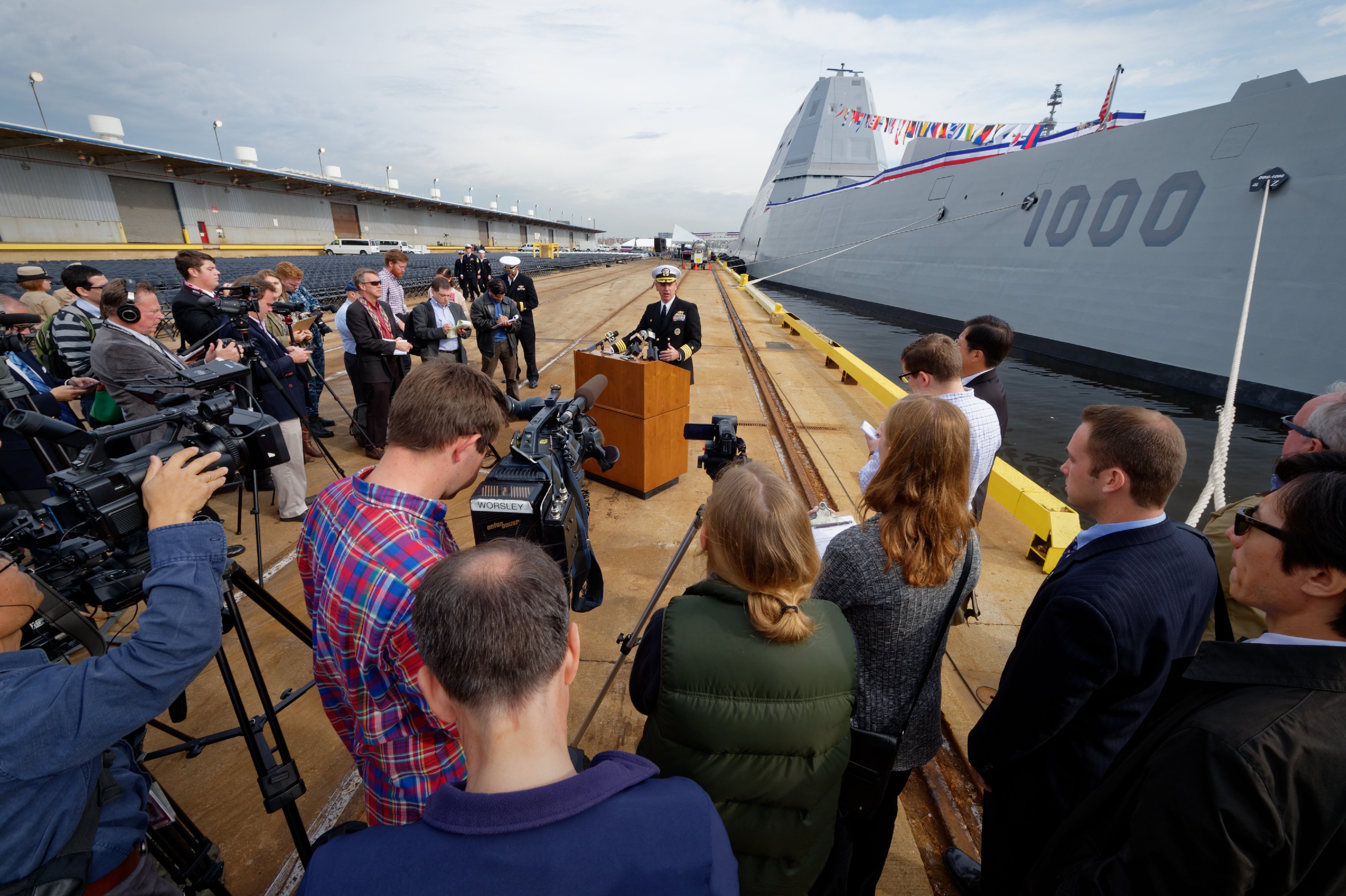 Capt. James A. Kirk, commanding officer of future USS Zumwalt (DDG 1000) answers questions from the media ahead of the ship's commissioning on Saturday. US Navy Photo