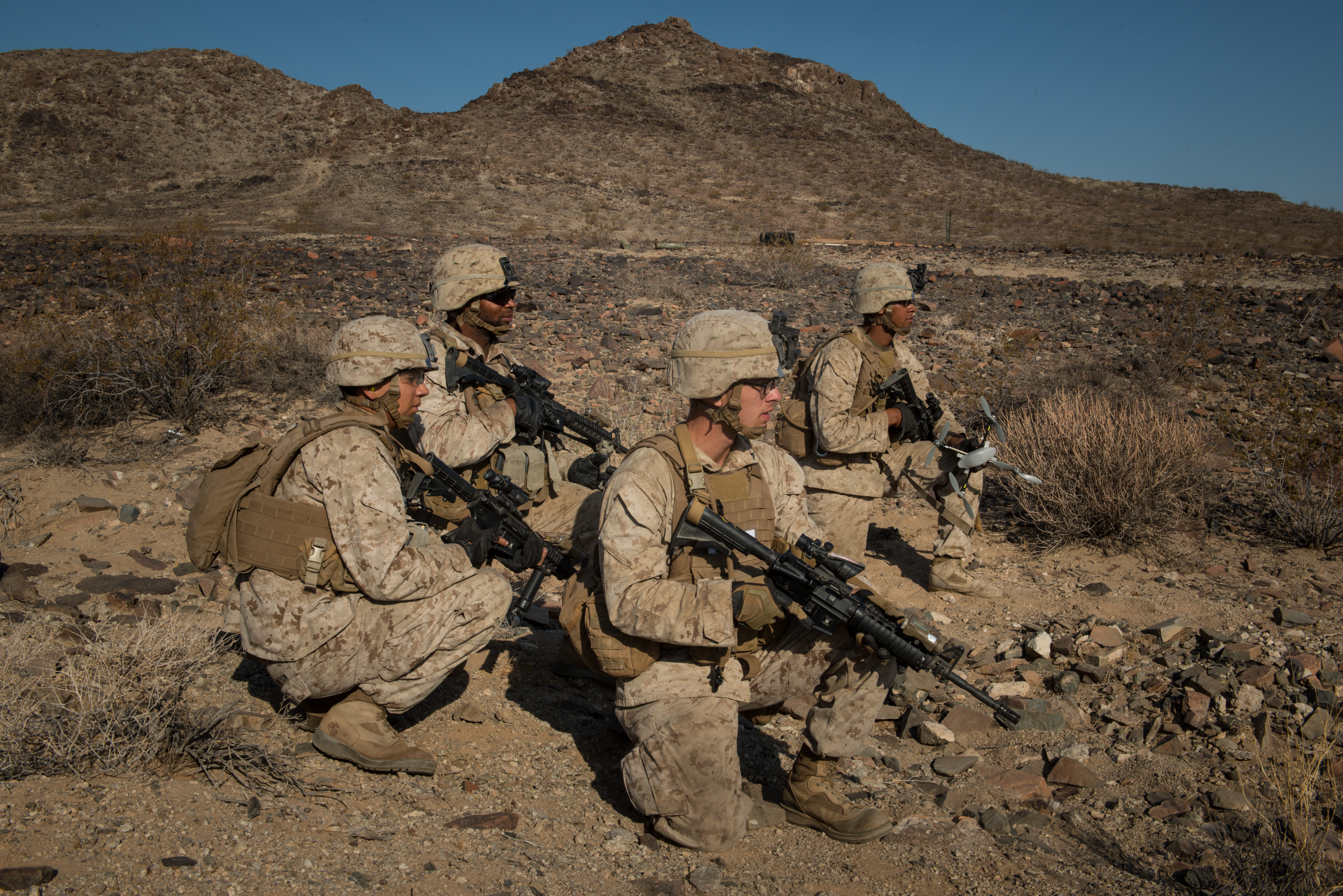 Marines with Kilo Company, 3rd Battalion, 5th Marine Regiment, prepare to raid a simulated enemy position during the Marine Air-Ground Task Force Integrated Experiment (MIX-16) at Marine Corps Air Ground Combat Center Twentynine Palms, Calif., Aug. 5, 2016. US Marine Corps photo.