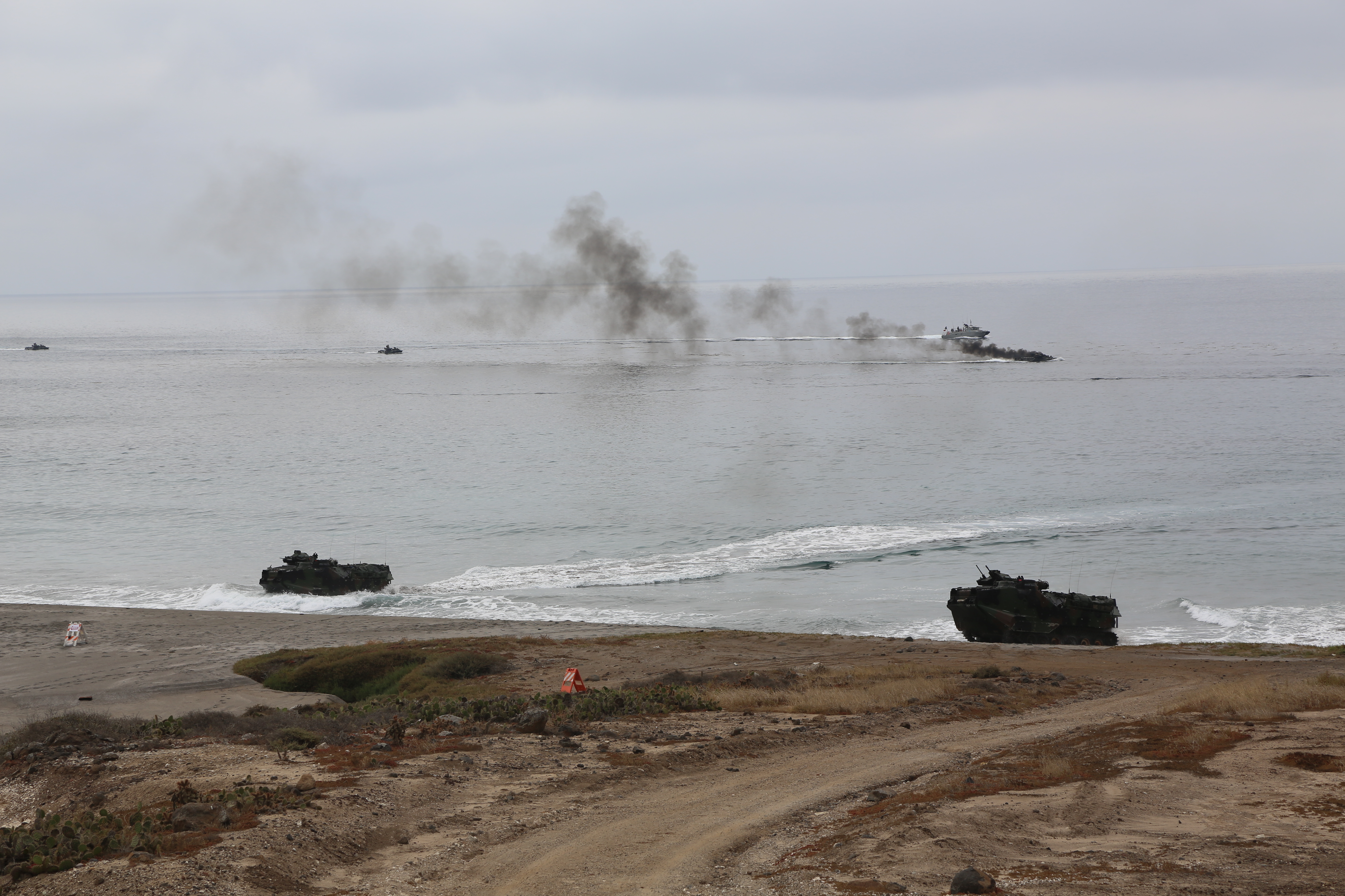 U.S. Marines with Bravo Company, 3rd Assault Amphibian Battalion and service members with the Mexican Navy take part in a mechanized assault exercise using assault amphibious vehicles to enhance their sea-to-land capabilities aboard San Clemente Island, California, July 30, 2016 during the Southern California portion of Rim of the Pacific 2016. US Marine Corps photo.