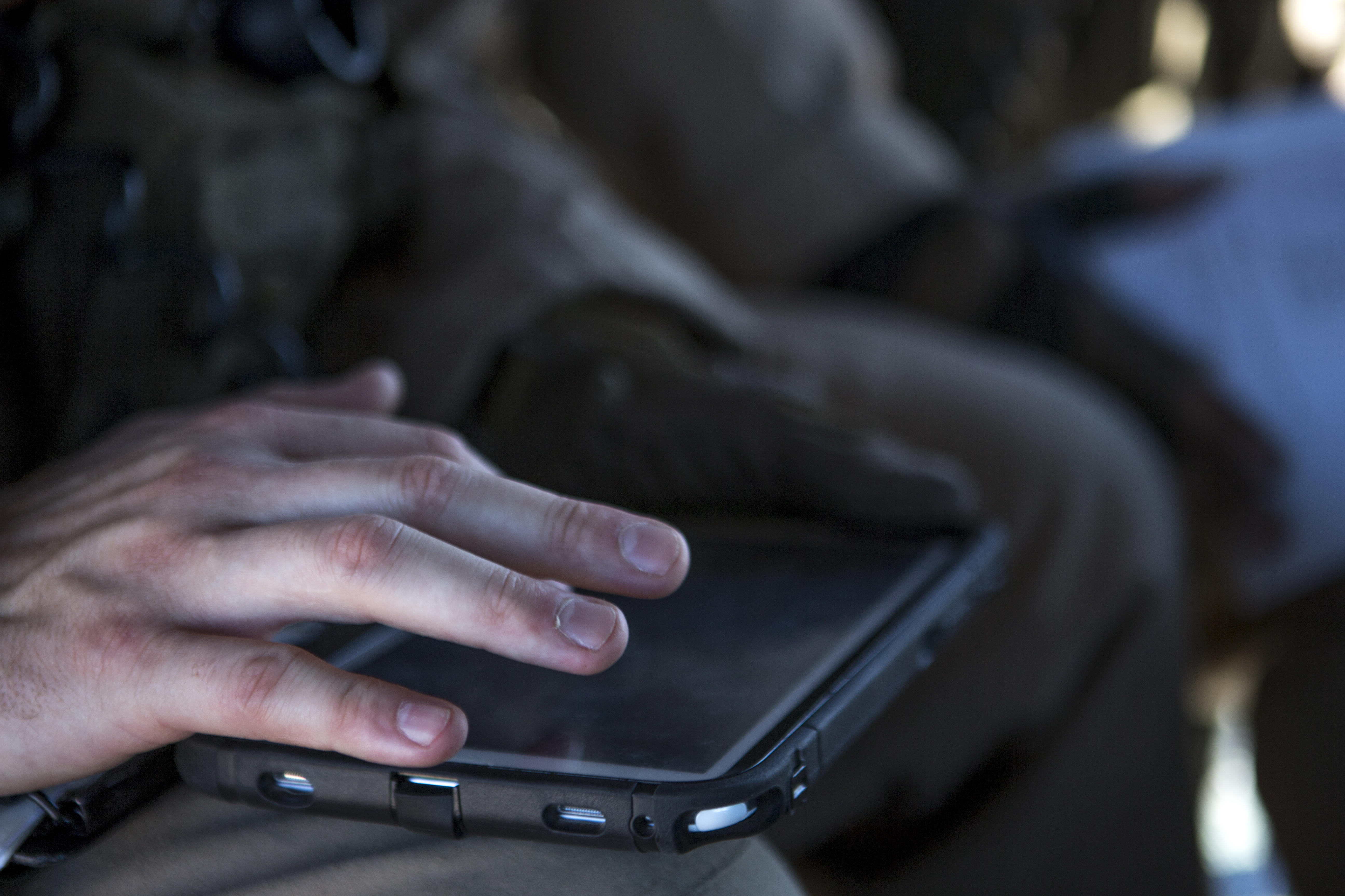 U.S. Marine Corps Cpl. Ty Morgan, a crew chief with Marine Light Attack Helicopter Squadron (HMLA) 269 uses a tablet to mark friendly and enemy targets during an urban close air support exercise in Yodaville, Ariz., Sept. 30, 2016. This exercise was part of Weapons Tactics Instructors course (WTI) 1-17, a seven week event hosted by MAWTS-1 cadre which emphasizes operational integration of the six functions of Marine Corps aviation in support of a Marine Air Ground Task Force. MAWTS-1 provides standardized advanced tactical training and certification of unit instructor qualifications to support Marine aviation Training and Readiness and assists in developing and employing aviation weapons and tactics (U.S. Marine Corps photo by Lance Cpl. Andrew Huff, MAWTS-1 COMCAM)