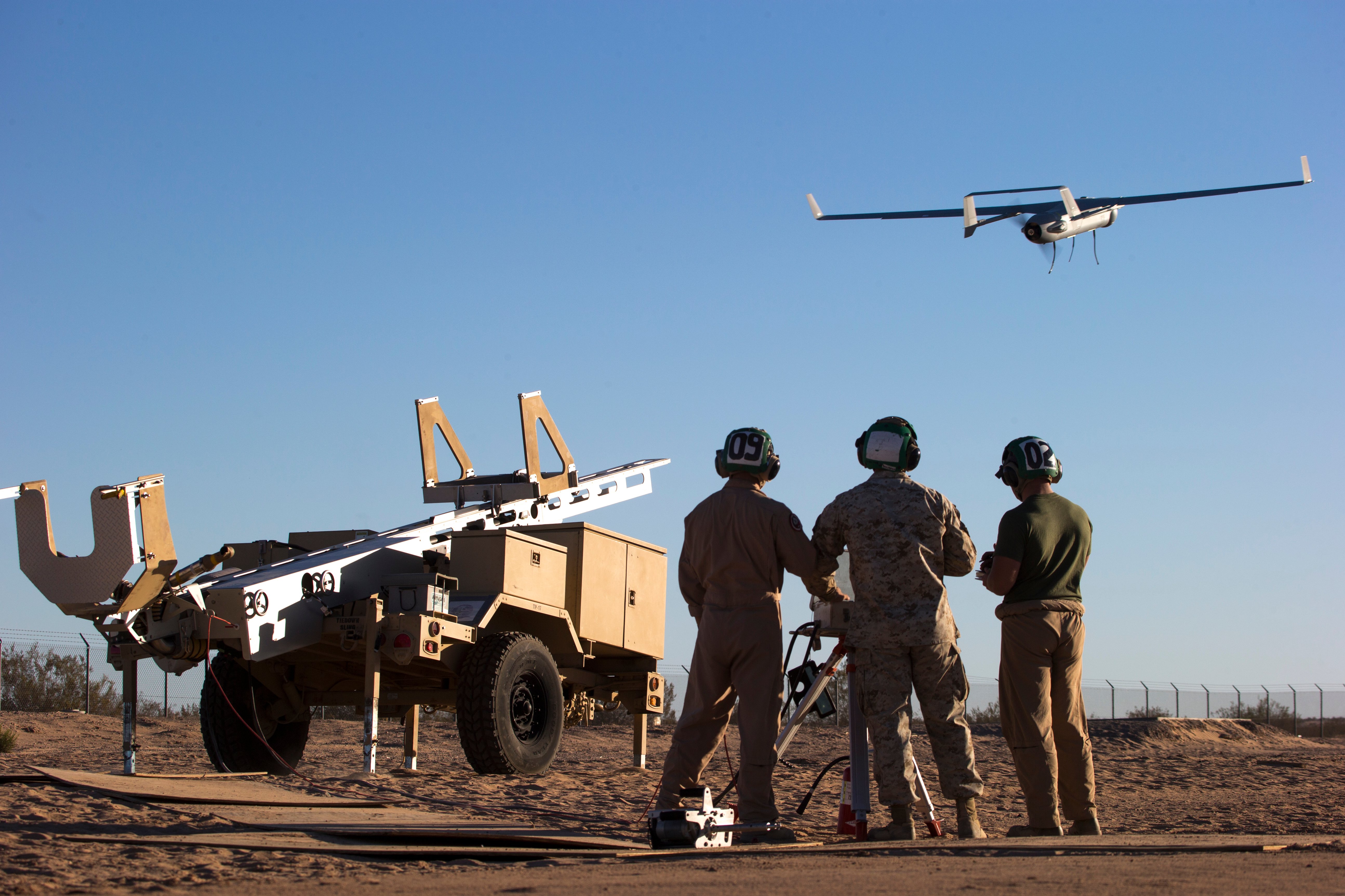 U.S. Marines with Marine Unmanned Aerial Vehicle Squadron (VMU) 2 launch a RQ-21A Blackjack for Assault Support Tactics 2 at Canon Air Defense Complex (P111), Yuma, Ariz., Oct. 12, 2016. This exercise was part of Weapons and Tactics Instructors course (WTI) 1-17, a seven week training event hosted by MAWTS-1 cadre. MAWTS-1 provides standardized tactical training and certification of unit instructor qualifications to support Marine Aviation Training and Readiness and assists in developing and employing aviation weapons and tactics. (U.S. Marine Corps photo by Cpl. AaronJames Vinculado, MAWTS-1)