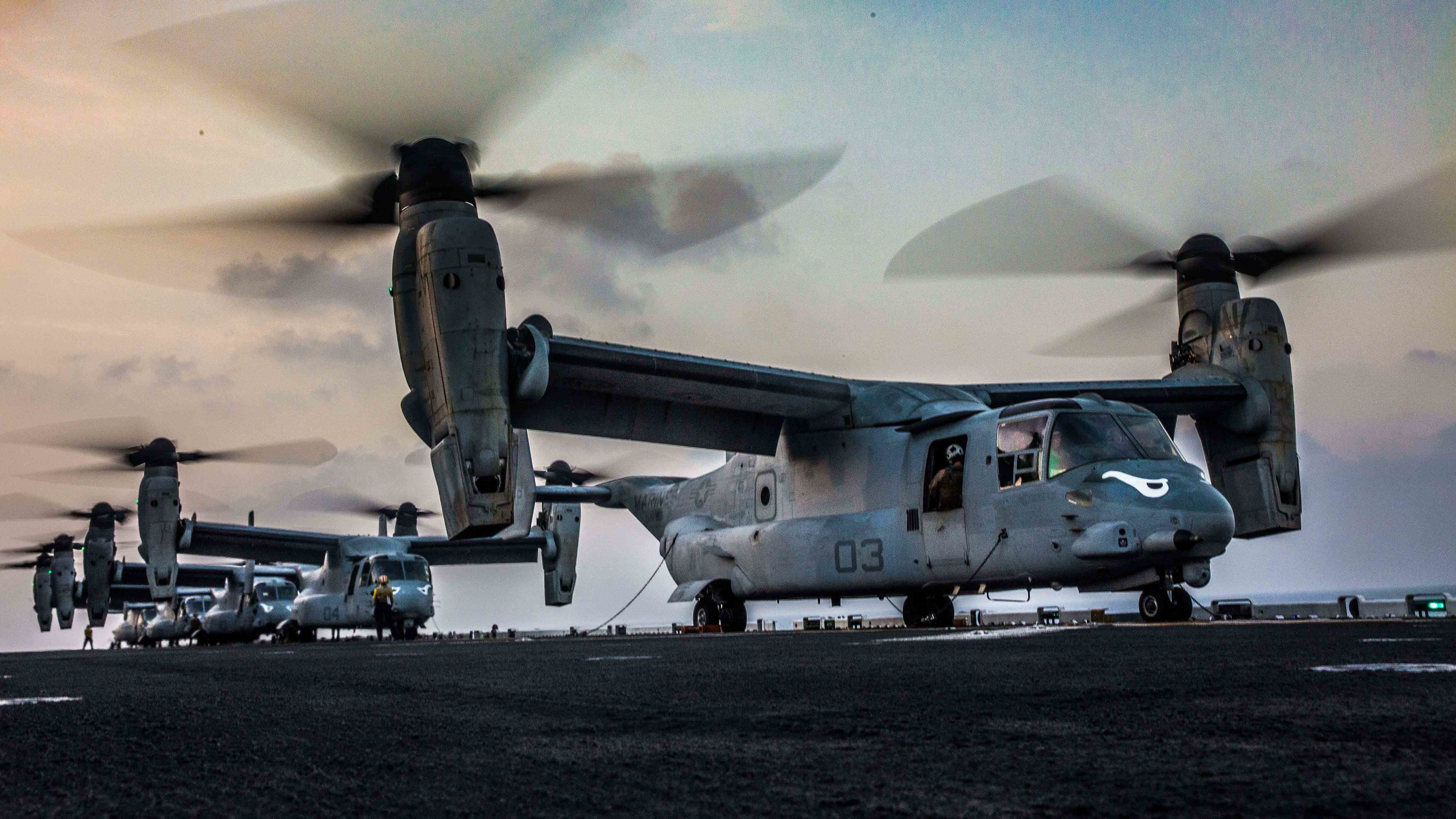 U.S. Marine MV-22 Ospreys, assigned to the Ridge Runners of Marine Medium Tiltrotor Squadron 163 (Reinforced), prepare to takeoff from the flight deck of the amphibious assault ship USS Makin Island (LHD 8) in support of a helo-borne raid during Exercise Alligator Dagger, in the Gulf of Aden, Dec. 21, 2016. US Navy photo.