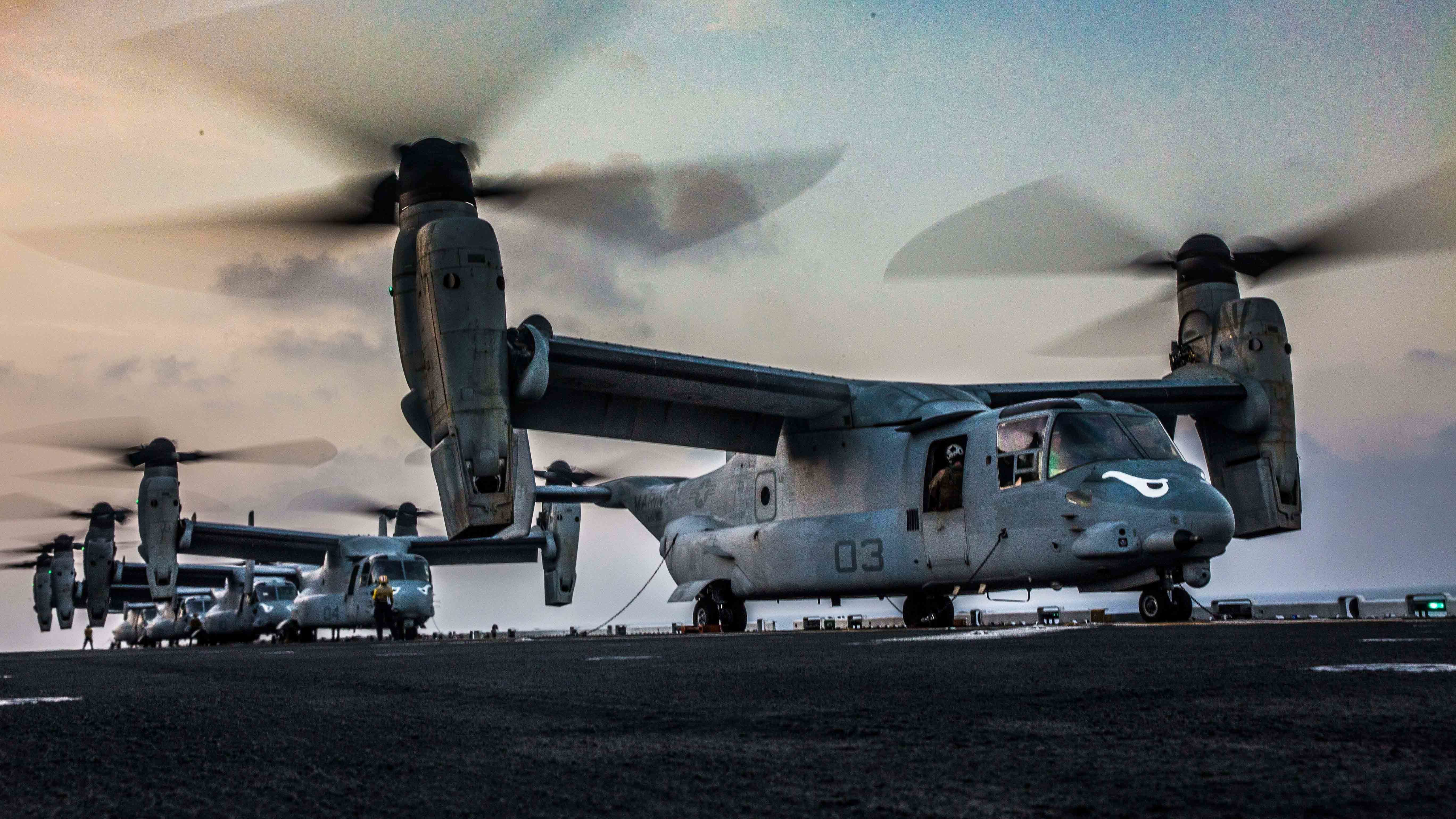 U.S. Marine MV-22 Ospreys, assigned to the Ridge Runners of Marine Medium Tiltrotor Squadron 163 (VMM-163)(Reinforced), prepare to takeoff from the flight deck of the amphibious assault ship USS Makin Island (LHD 8) in support of a helo-borne raid during Exercise Alligator Dagger, in the Gulf of Aden, Dec. 21, 2016. The unilateral exercise provides an opportunity for the Makin Island Amphibious Ready Group and 11th Marine Expeditionary Unit to train in amphibious operations within the U.S. 5th Fleet area of operations. The 11th MEU is currently supporting U.S. 5th Fleet’s mission to promote and maintain stability and security in the region. (U.S. Marine Corps photo by Lance Cpl. Brandon Maldonado)