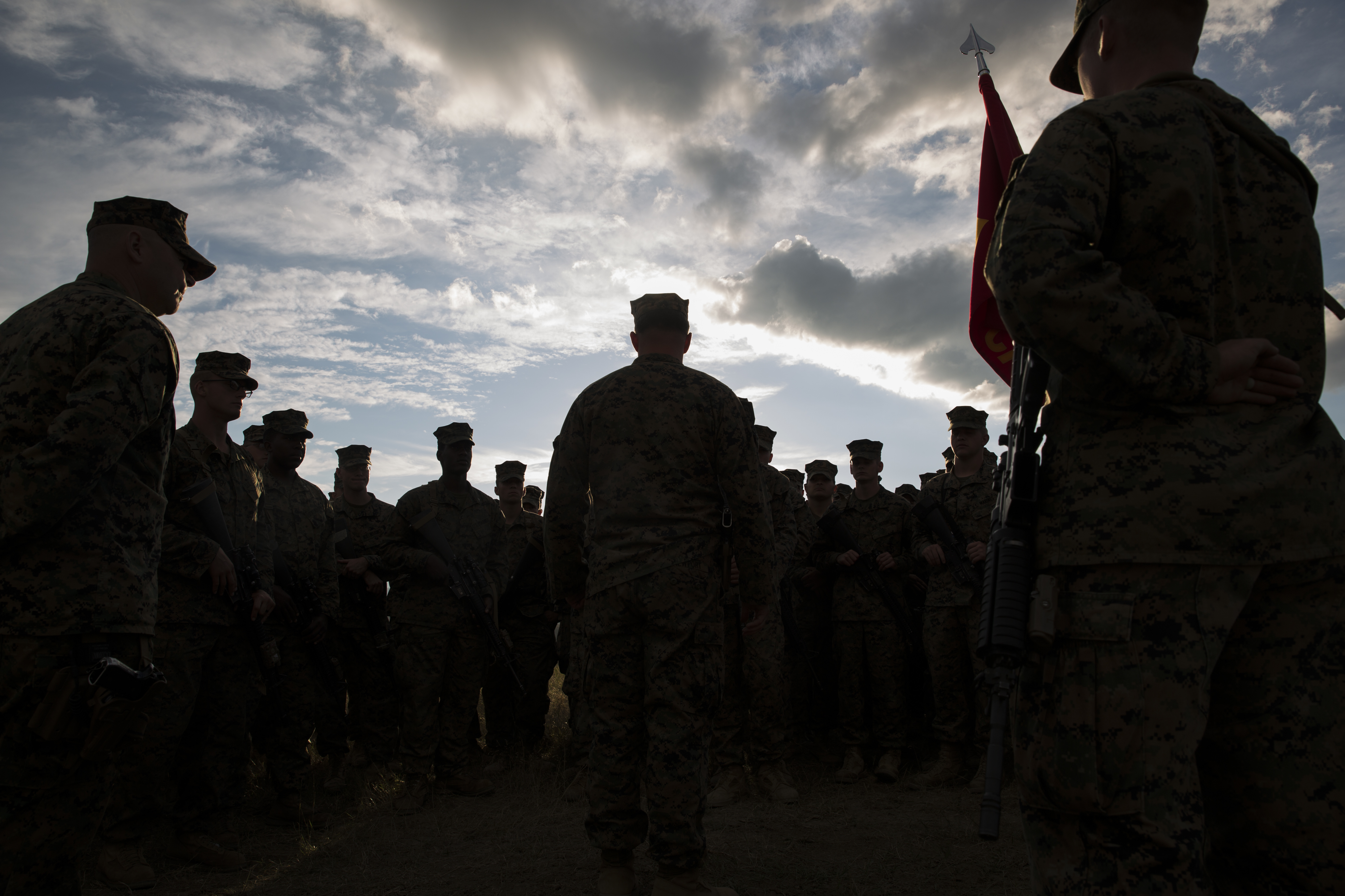U.S. Marines with the Combined Arms Company conduct a promotion ceremony overlooking the base camp for Agile Spirit 16, Sept. 1, 2016. US Marine Corps Photo