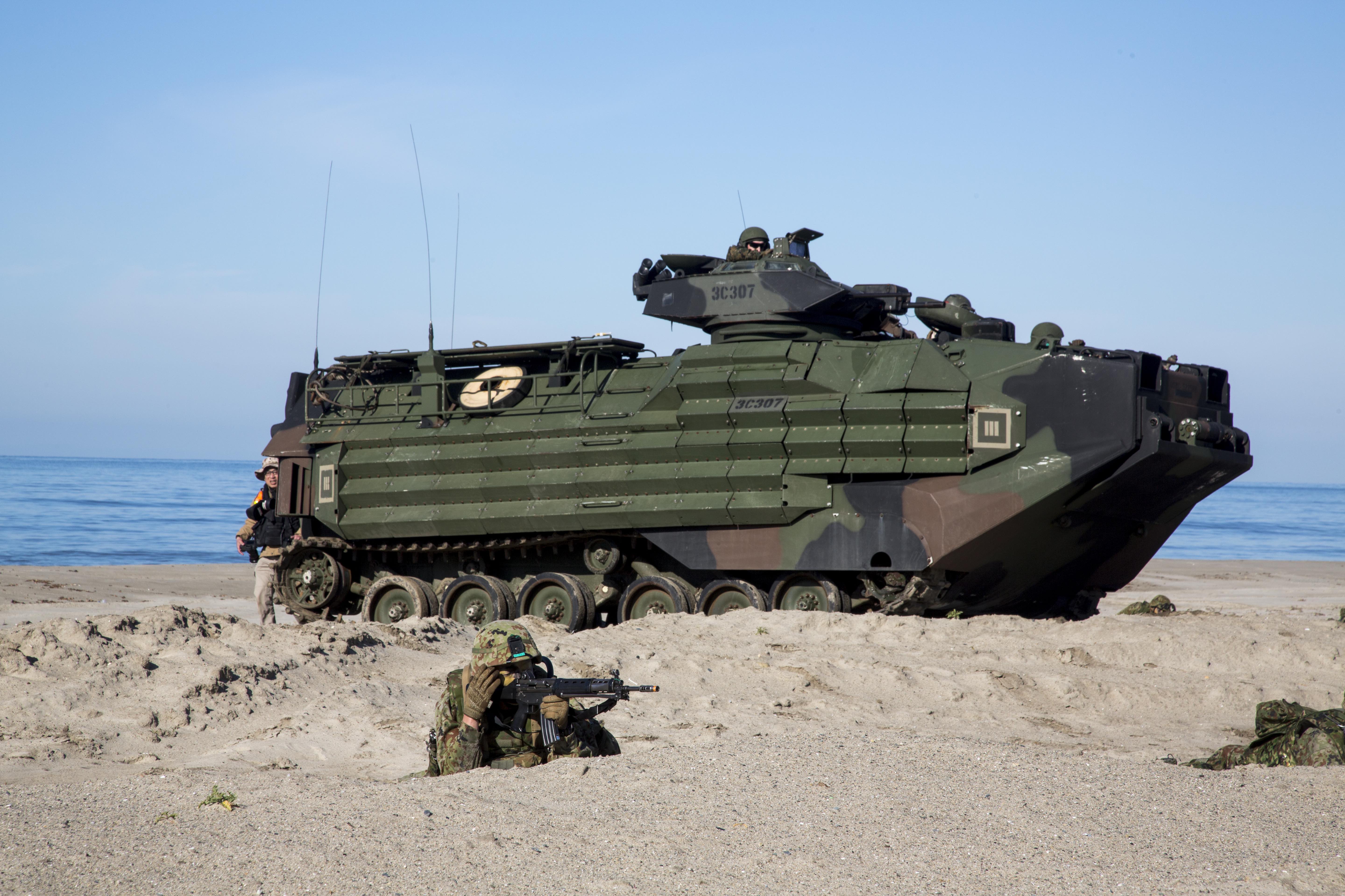 Japan Ground Self Defense Force soldiers establish security after exiting an Assault Amphibian Vehicle, during Exercise Iron Fist 2017, aboard Marine Corps Base Camp Pendleton, Calif. on Feb. 25, 2017. US Marine Corps Photo 