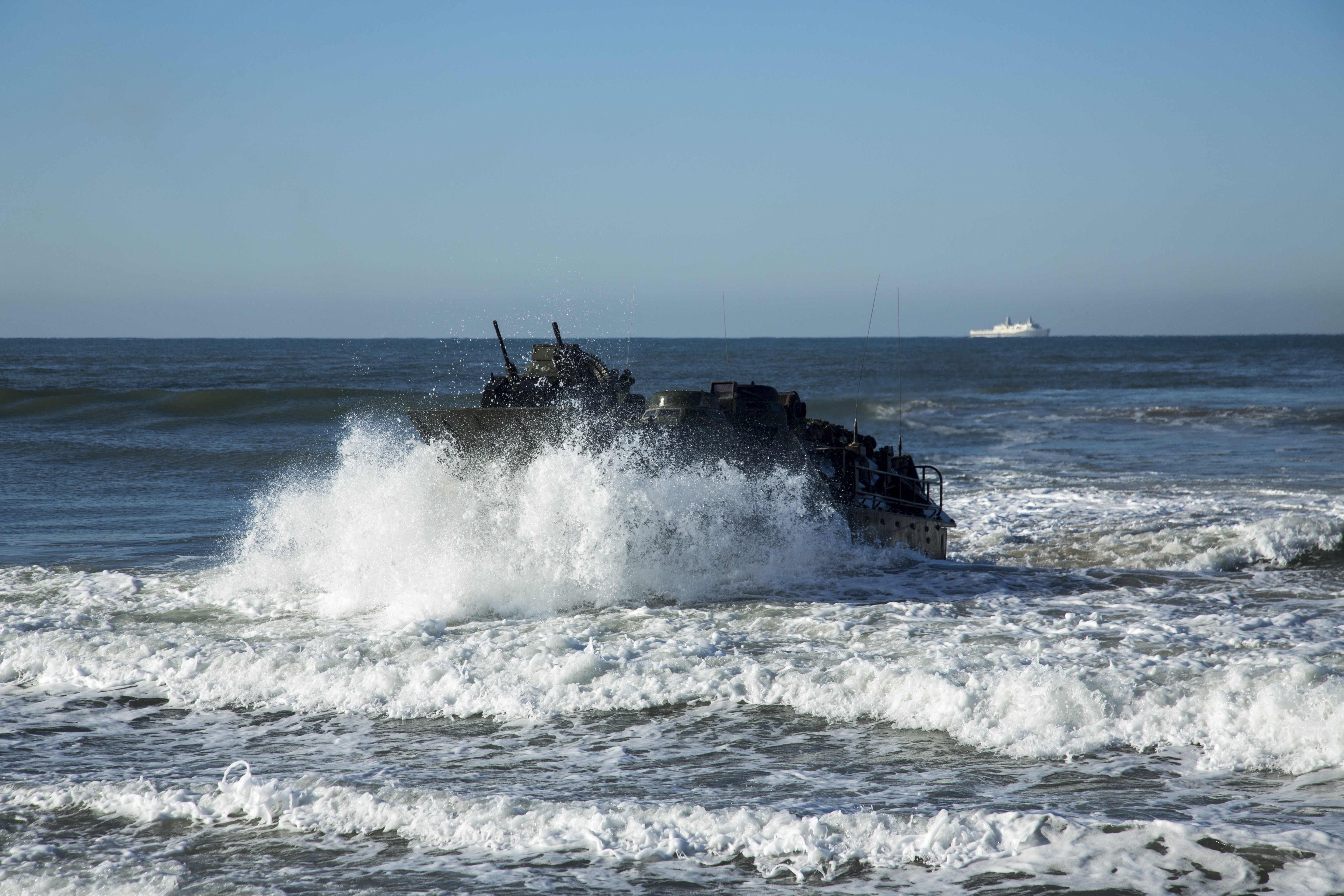 US Marine Corps Assault Amphibious Vehicles, manned by Japan Ground Self Defense Force soldiers land on Red Beach Training Area, during Exercise Iron Fist 2017, aboard Marine Corps Base Camp Pendleton, Calif. on Feb. 25, 2017. US Marine Corps Photo