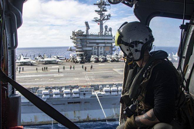 Aircraft Carrier USS Nimitz Supporting Guam Relief Efforts with Helicopters, Communications